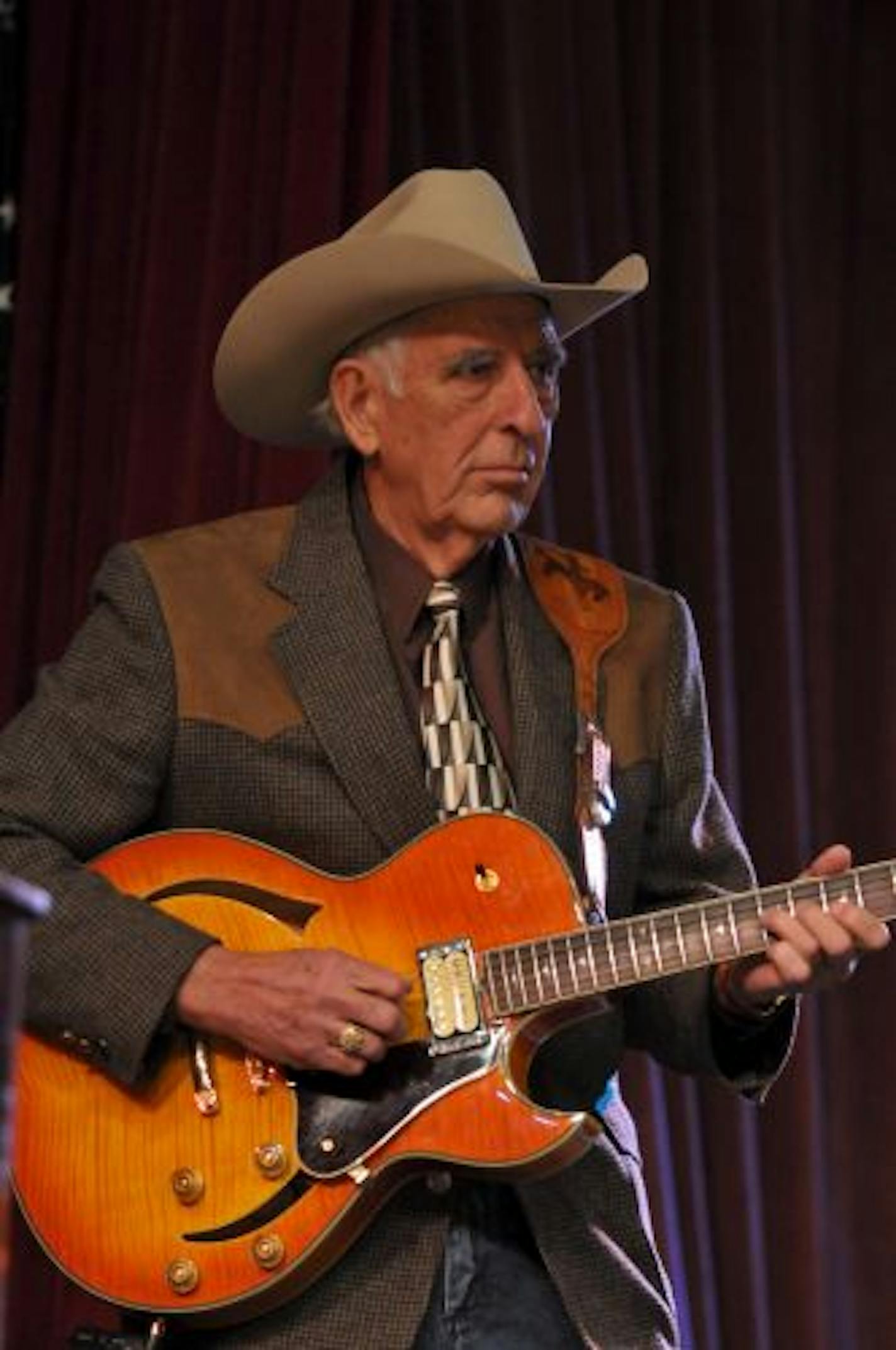 epa01622803 American musician Tommy Allsup, a former member of Buddy Holly's band the Crickets, plays during The '50 Winter's Later' tribute concert in Clear Lake, Iowa, USA, 02 February 2009. Fans from around the world have descended on the region for the week long tribute to Buddy Holly, Ritchie Valens, and J.P. 'The Big Bopper' Richardson, who along with pilot Roger Peterson, perished in a plane crash in a snowy corn field in 03 February 1959. EPA/STEVE POPE