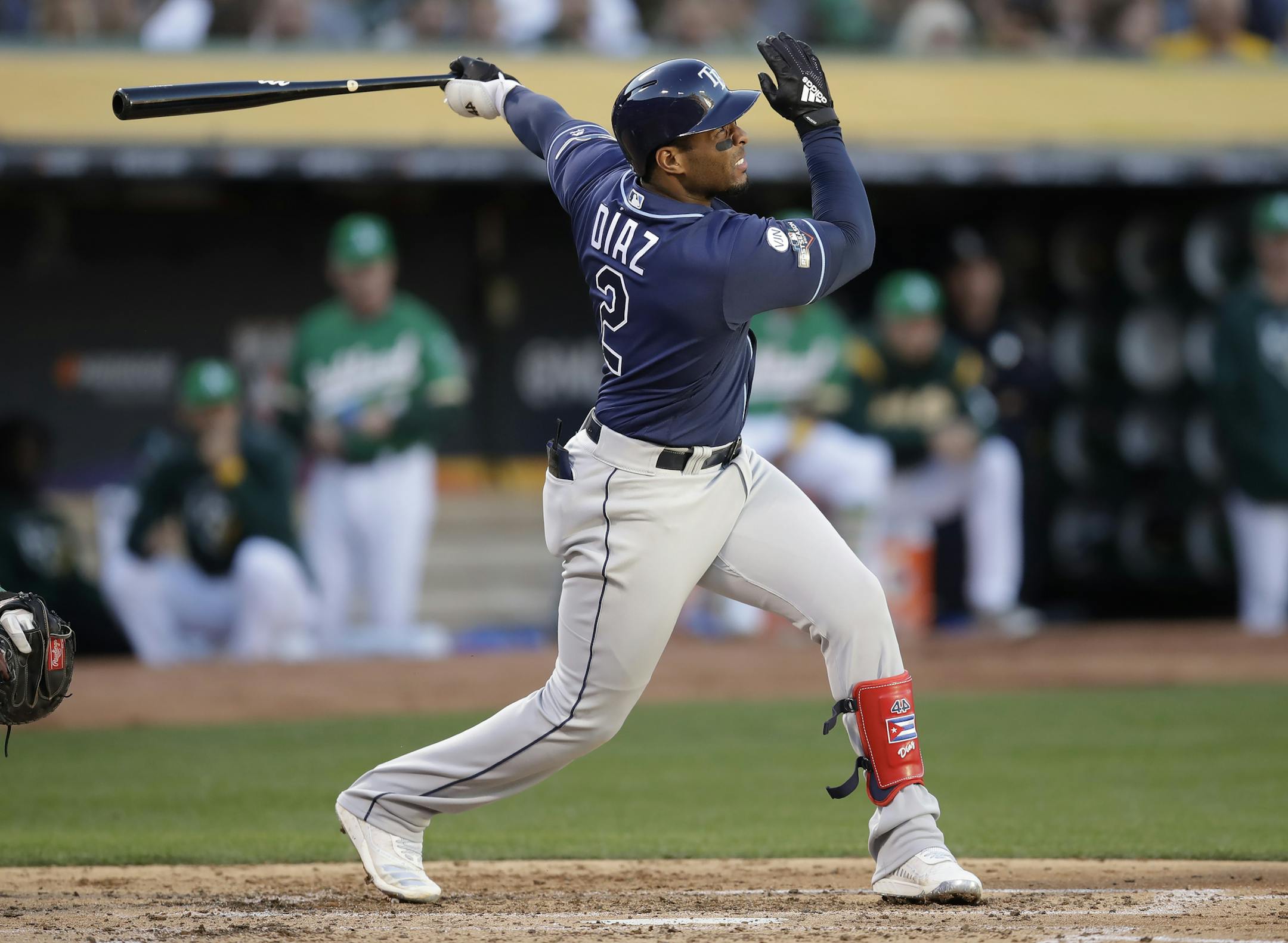 Tampa Bay Rays' Yandy Diaz watches his solo home run against the Oakland Athletics during the third inning of an American League wild-card baseball game in Oakland, Calif., Wednesday, Oct. 2, 2019. (AP Photo/Ben Margot)