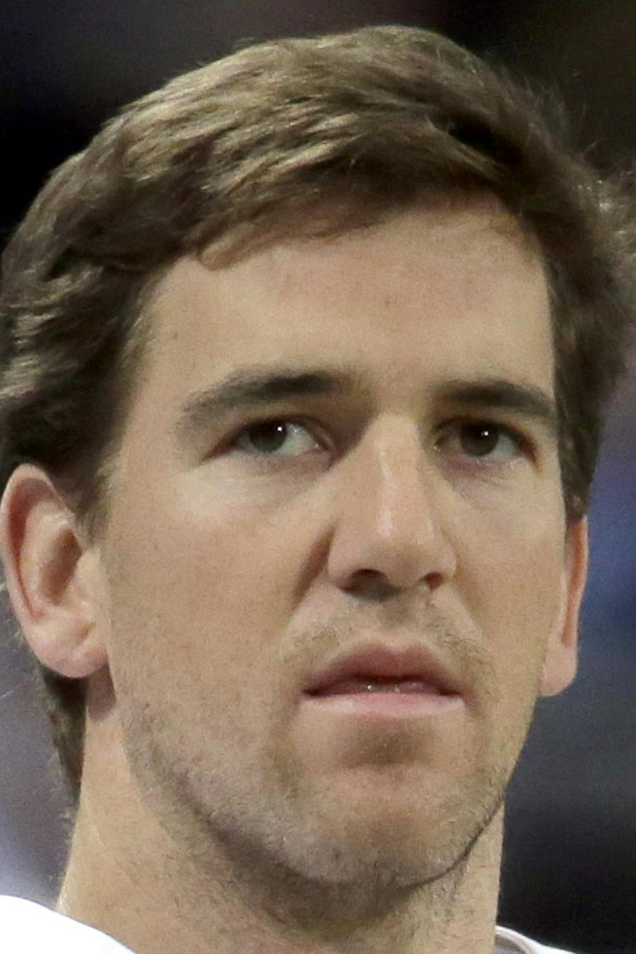New York Giants quarterback Eli Mannin stretches before the start of an NFL football game between the St. Louis Rams and the New York Giants Sunday, Dec. 21, 2014, in St. Louis. (AP Photo/Charlie Riedel) ORG XMIT: MOJR