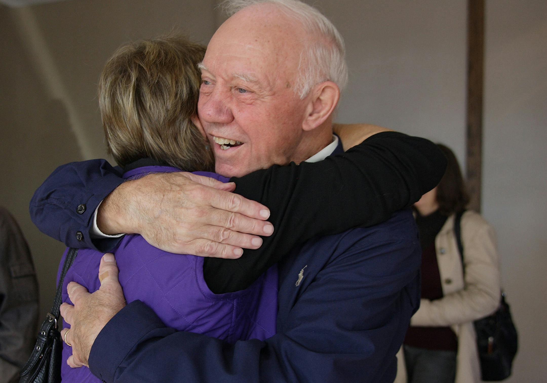 In this photo taken Oct. 3, 2010, cU.S. Rep. Jim Oberstar, D-Minn., gets a hug from Pam Kramer, director of Duluth Local Initiatives Support Corporation, at a campaign rally in Duluth, Minn. Oberstar is running for re-election to the 8th District House seat he has held since 1975. (AP Photo/Julia Cheng)