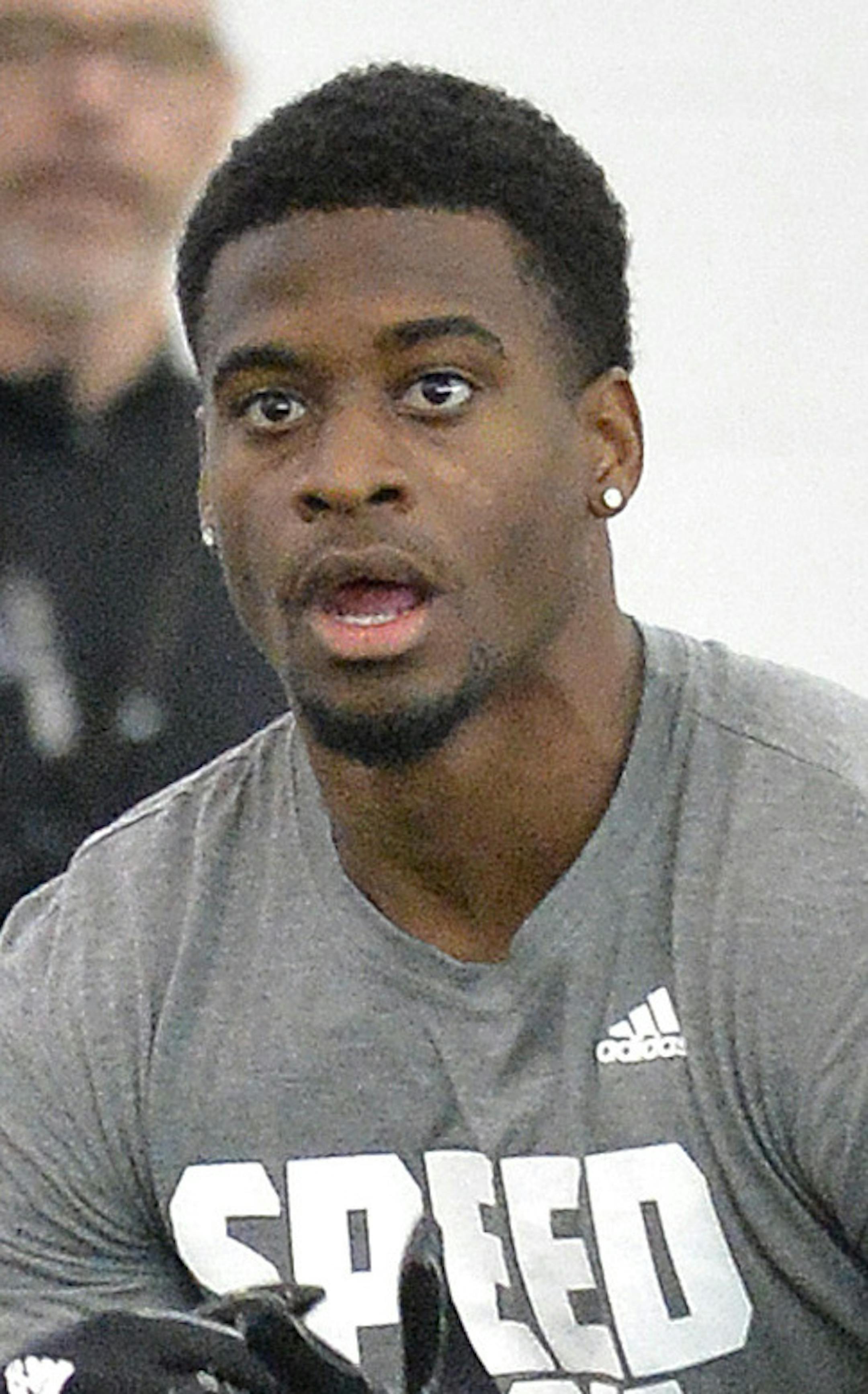 Running back DeVante Parker runs a route during passing drills during Louisville's NFL football Pro Day in Louisville, Ky., Wednesday, March 11, 2015. (AP Photo/Timothy D. Easley) ORG XMIT: KYTE107