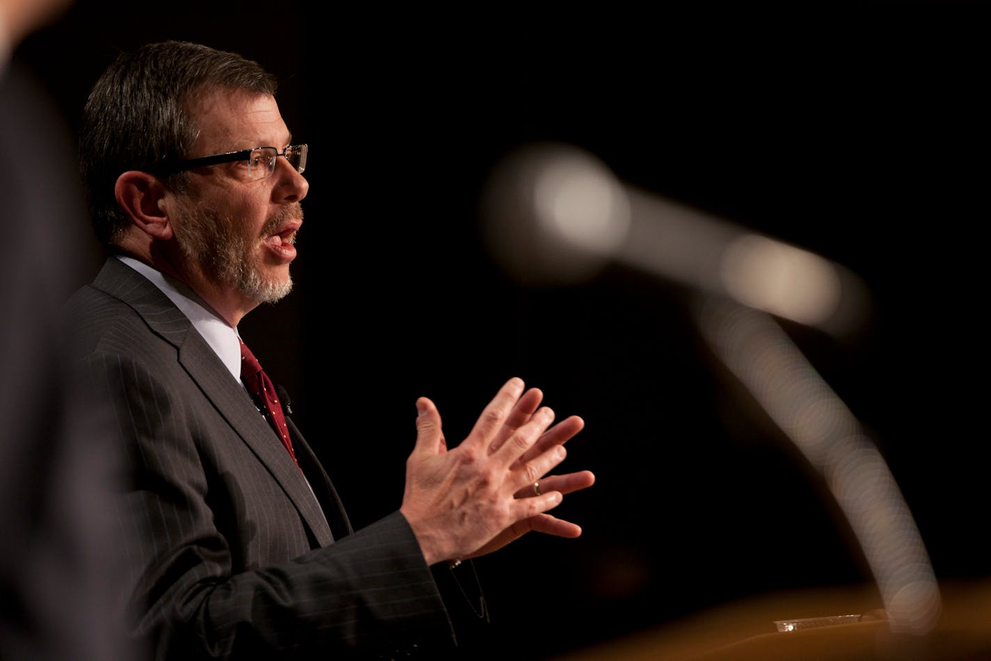 University of Minnesota President Eric Kaler answered a question from a faculty member after he delivered his first State of the University speech on March 1, 2012 in Coffman Memorial Theater on the Minneapolis, Minn., campus.