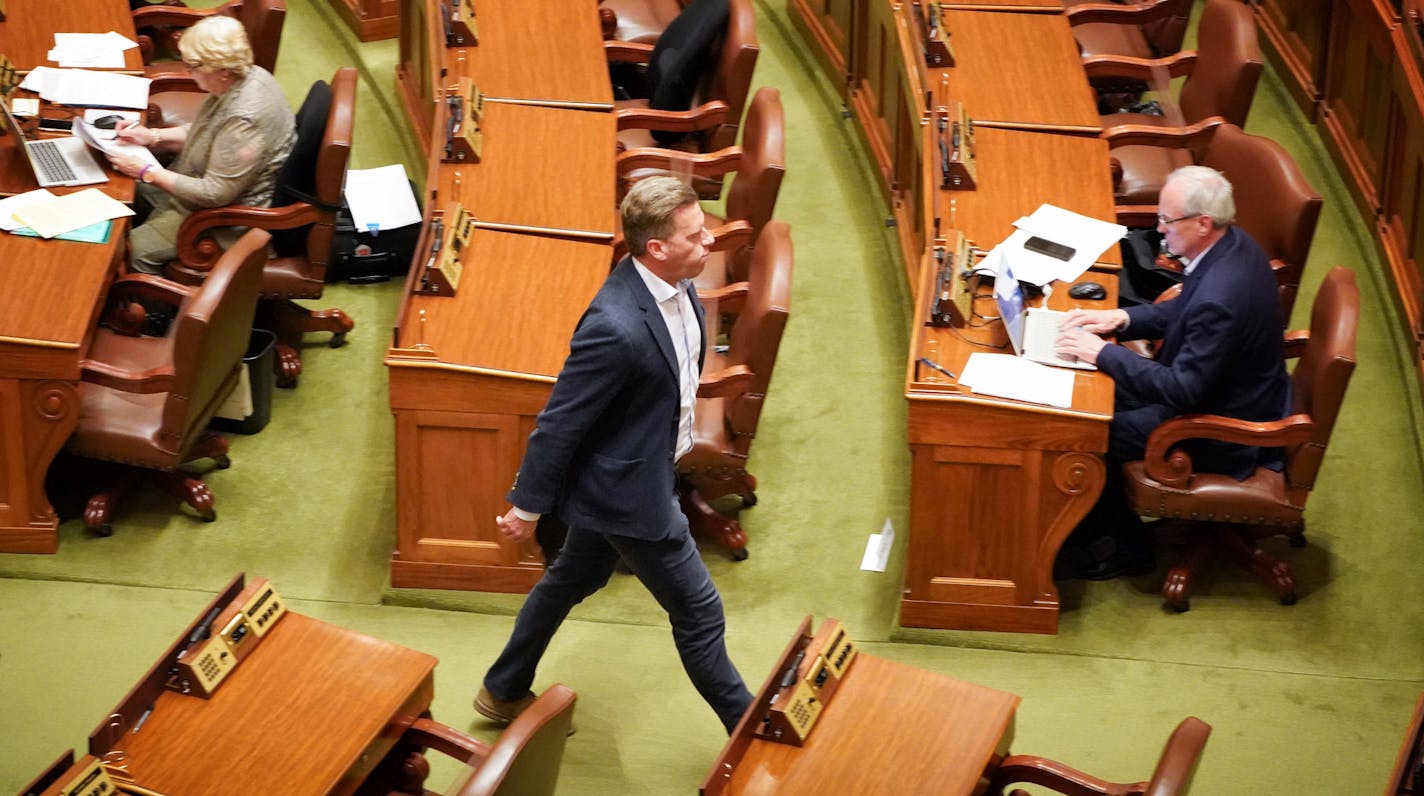 House Minority Leader Kurt Daudt, R-Crown walked out of the House Chamber not wearing a mask. All the DFL legislators choose to wear a mask on the House floor and all the Republican legislators choose not to wear masks on the floor. ] GLEN STUBBE • glen.stubbe@startribune.com Sunday, May 17, 2020 The House floor on the final day of the regular Minnesota legislative session that votes may be cast for bills. A small number of legislators including their leaders, must stay in St Paul. The rest list