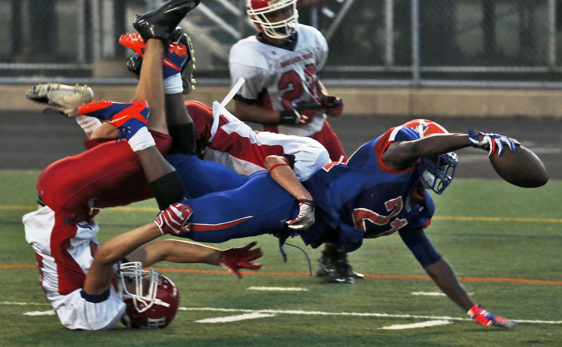 Minneapolis Washburn vs .St. Paul Highland Park. Washburn running back Jeffrey Jones reached out with the ball for the goal line but Highland Park tacklers stopped him just short of a touchdown. (MARLIN LEVISON/STARTRIBUNE(mlevison@startribune.com)