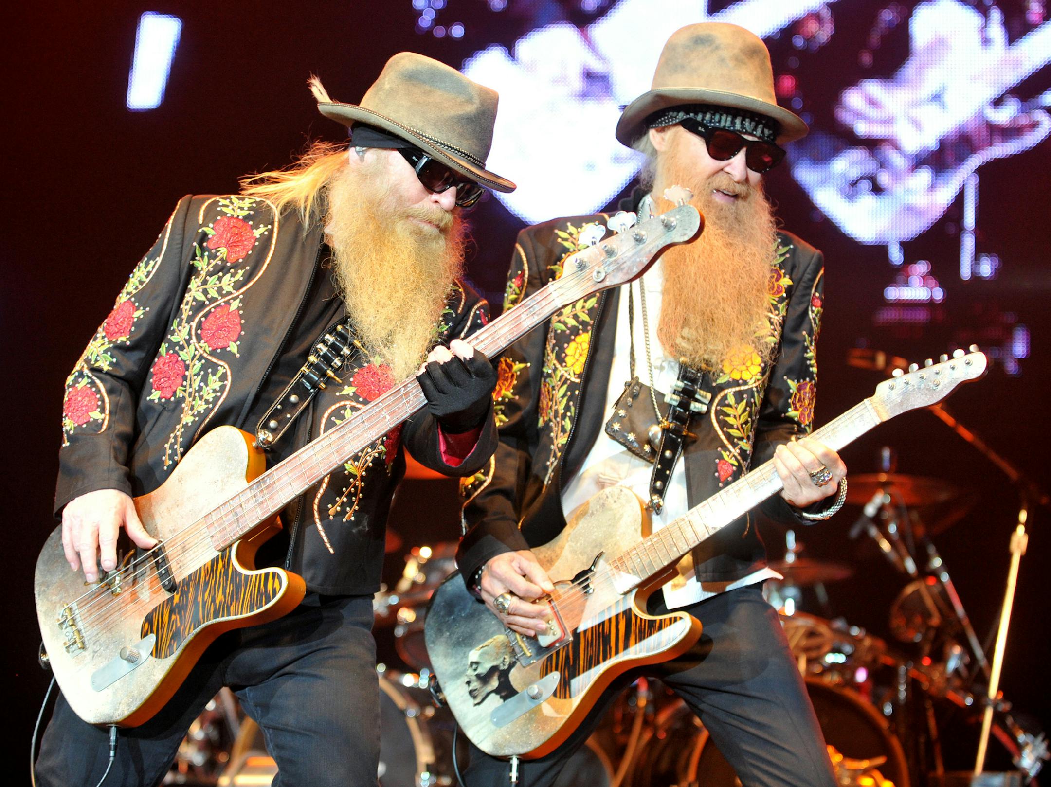Dusty Hill, left, and Billy Gibbons of the U.S. rock band ZZ Top perform during their Summer/Fall Tour concert in Pardubice, Czech Republic, on Monday, July 8, 2013. (CTK Photo/Vostarek Josef) SLOVAKIA OUT ORG XMIT: MIN2013072909543136