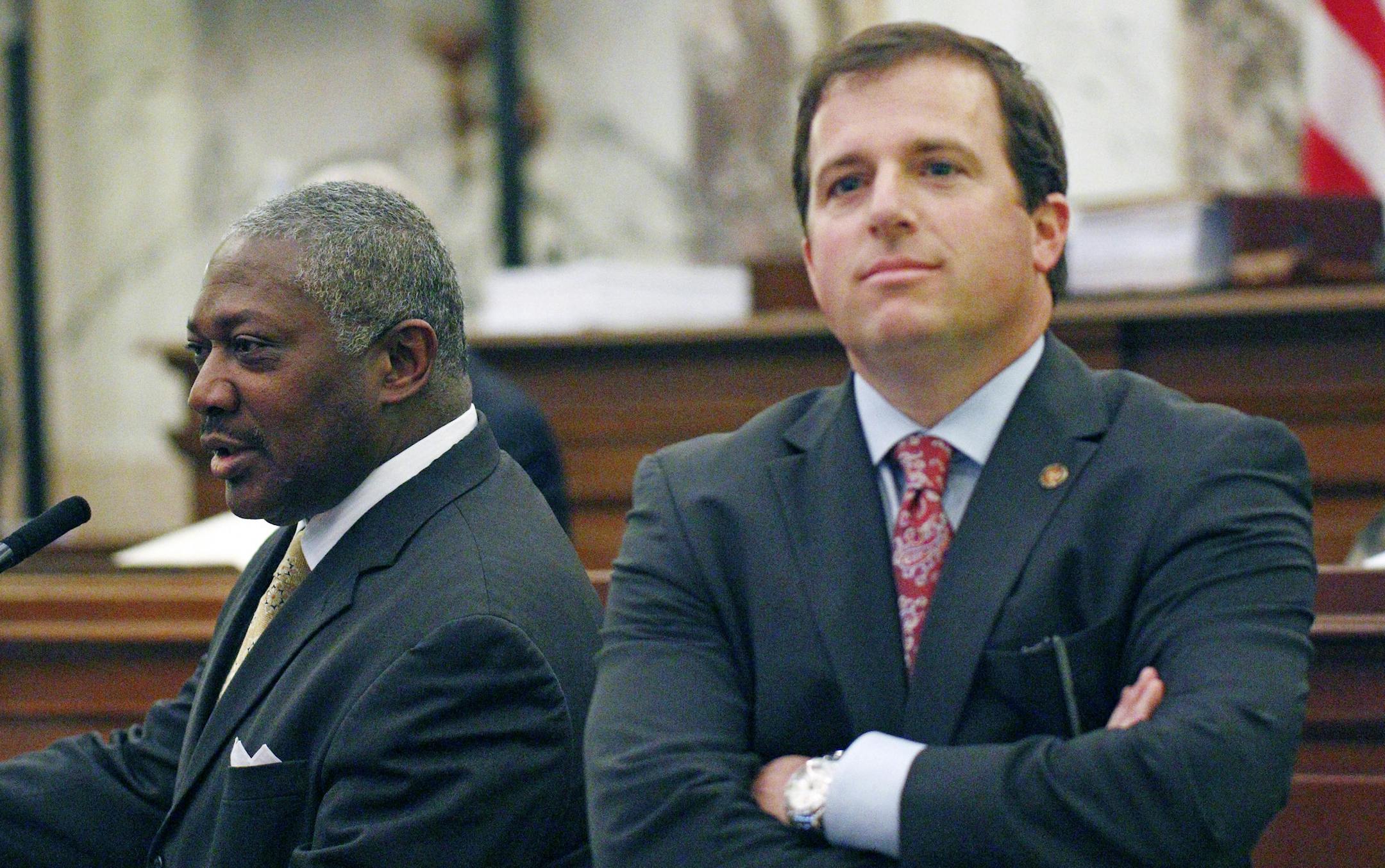 Sen. Josh Harkins, R-Flowood, right, reacts as Sen. John Horhn, D-Jackson, left, purposes amendments that would affect Harkins' proposed legislation that would shift control of the Jackson-Medgar Wiley Evers International Airport to state officials and surrounding counties, Thursday, March 3, 2016 in Senate chambers at the Capitol in Jackson, Miss. The bill, which was approved on a 29-18 vote, would replace the five-member Jackson Municipal Airport Authority with a nine-member Jackson Metropolit