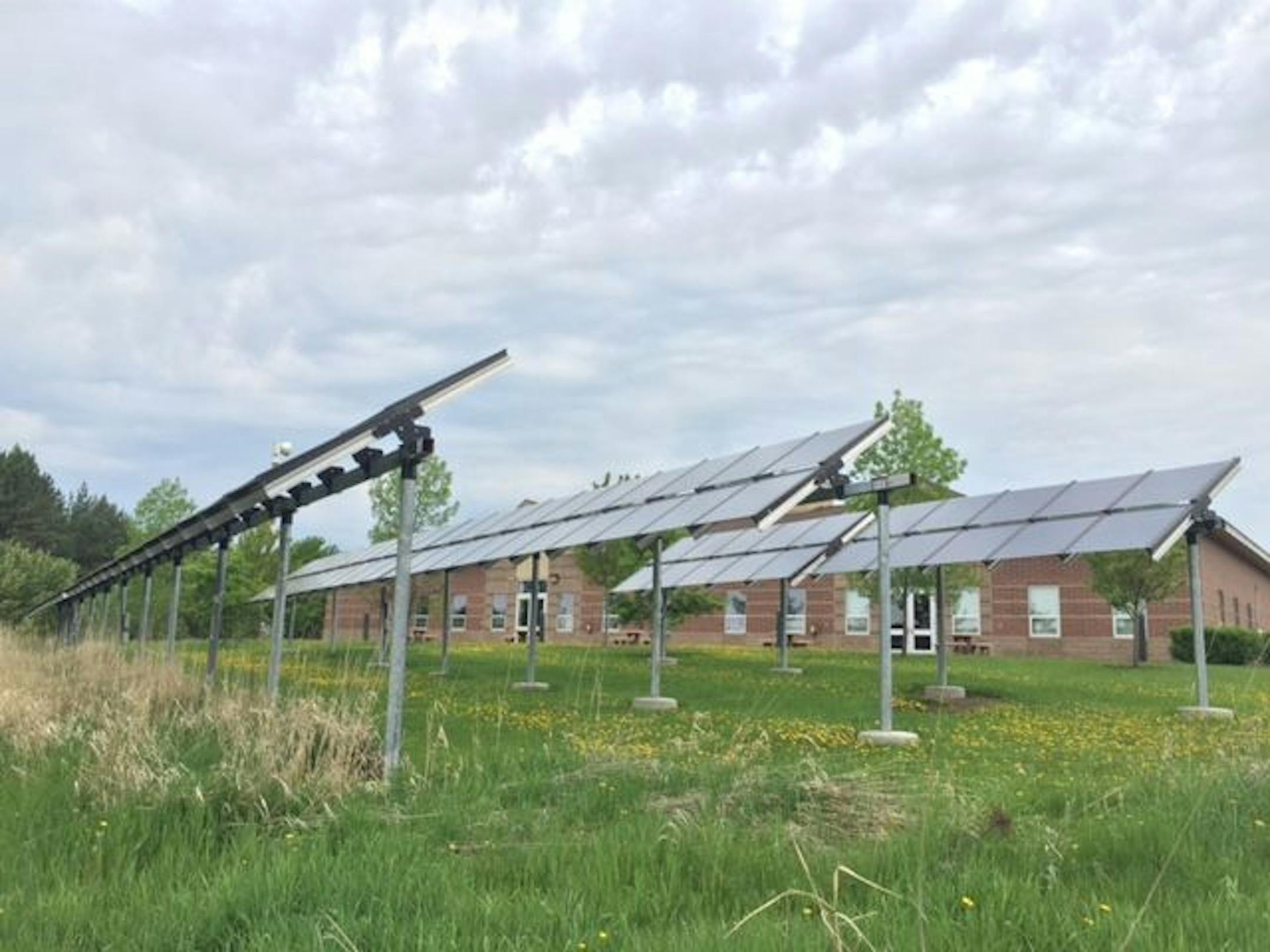 Solar panels installed at the city of Mountain Iron by Silicon Energy, the solar plant's previous owner. New operator Heliene Inc. expects employment to rise.