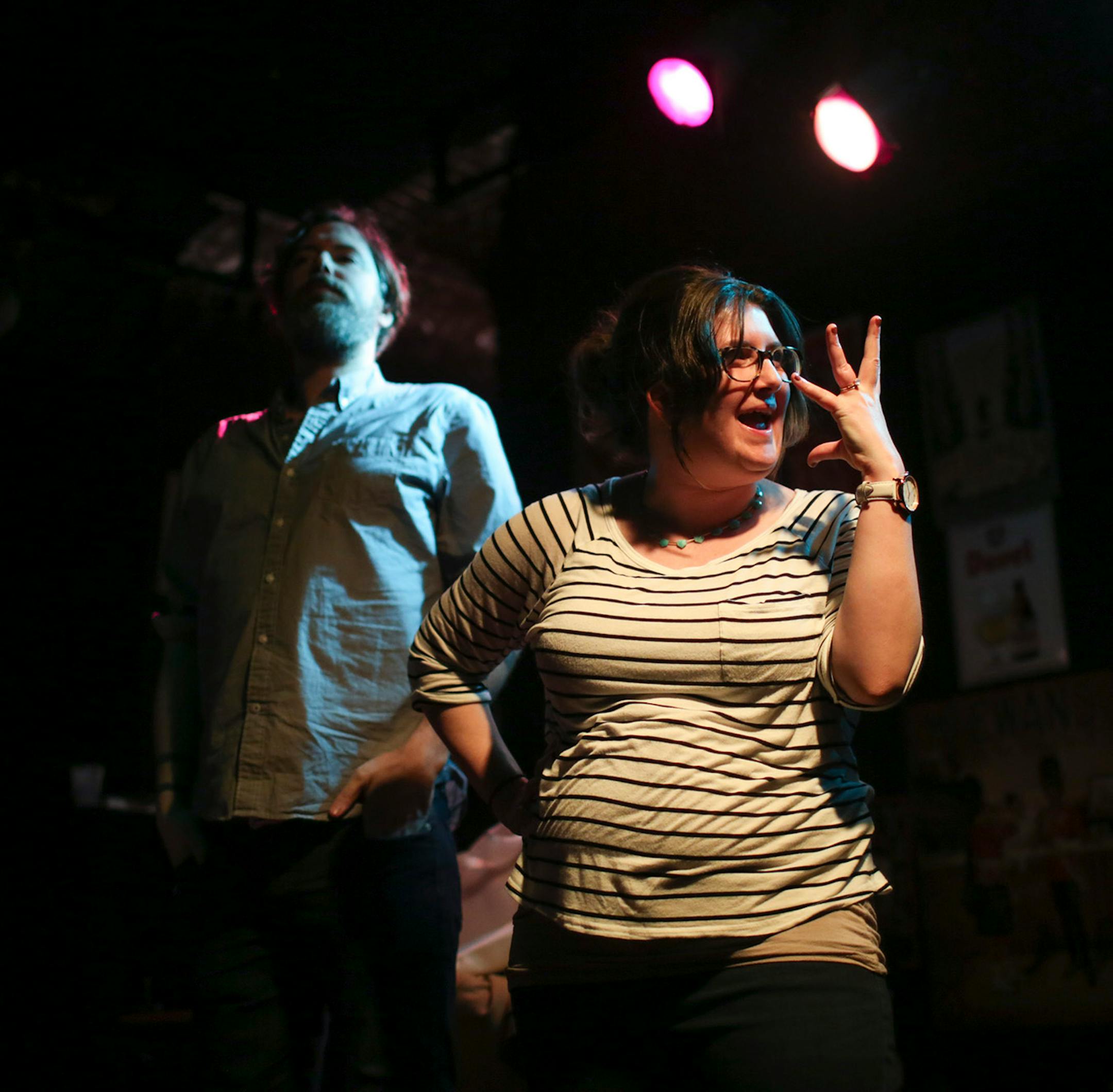 Literary Death Match finalists Mark Doten and Claire Vaye Watkins during the deciding final round Wednesday night at Nomad World Pub. ] JEFF WHEELER ï jeff.wheeler@startribune.com One of the off-site events at the start of the AWP Conference & Bookfair was the Literary Death Match Wednesday night, April 8, 2015 at Nomad World Pub in Minneapolis. Four writers read their work and were judged by a panel of three all star judges.