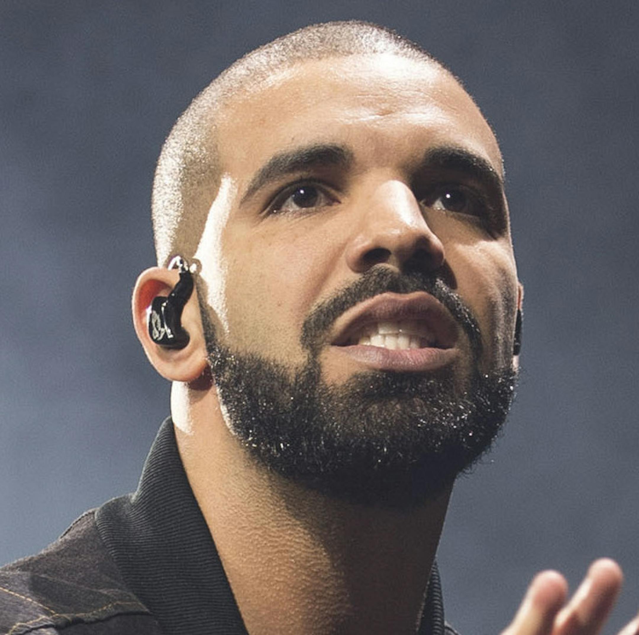 FILE - In this Oct. 8, 2016 file photo, Drake performs on stage in Toronto, Canada. Drake and the Chainsmokers are on track to own the night at the 2017 Billboard Music Awards on Sunday, May 21, in Las Vegas. The rapper and electronic dance duo are the top contenders at Sunday’s show with 22 nominations each. (Photo by Arthur Mola/Invision/AP, File)