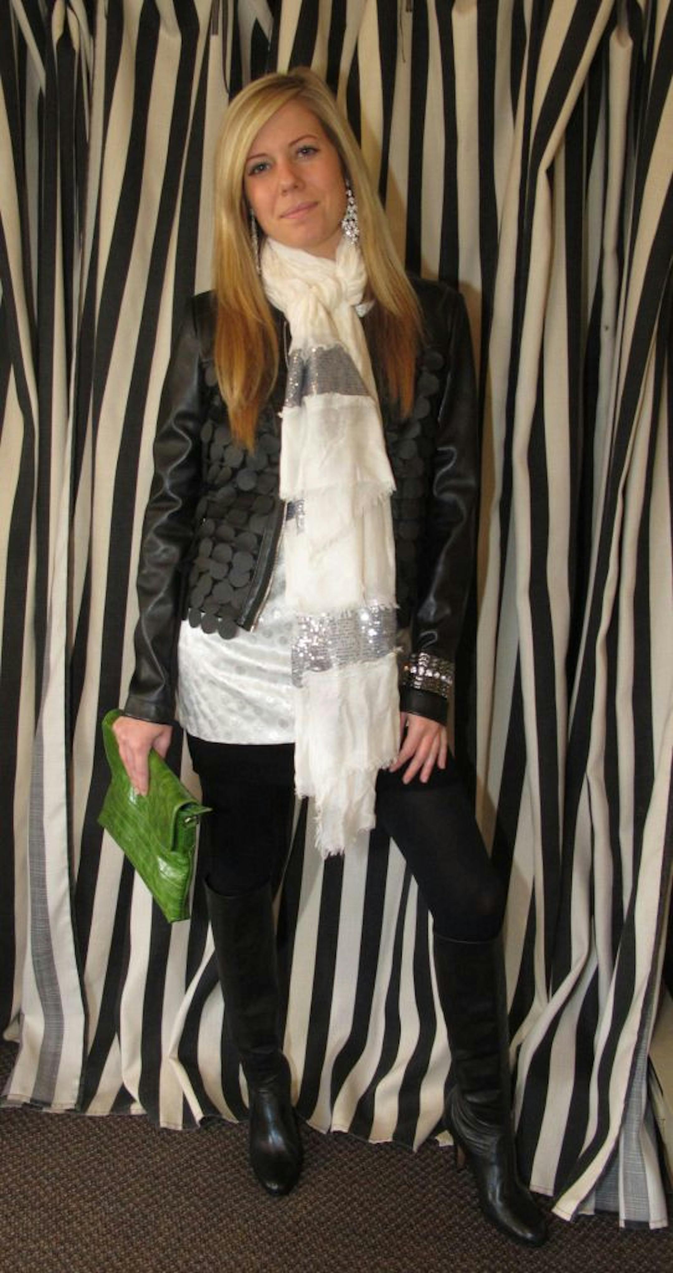 Kelissa Stempski, owner of Allee Metro Chic, wears Rinaschimento jacket ($259), Anne M. Cramer tunic ($120), scarf ($39), Parasuco sweater dress ($79), scarf ($39) and Chocolat Blu bag ($139).