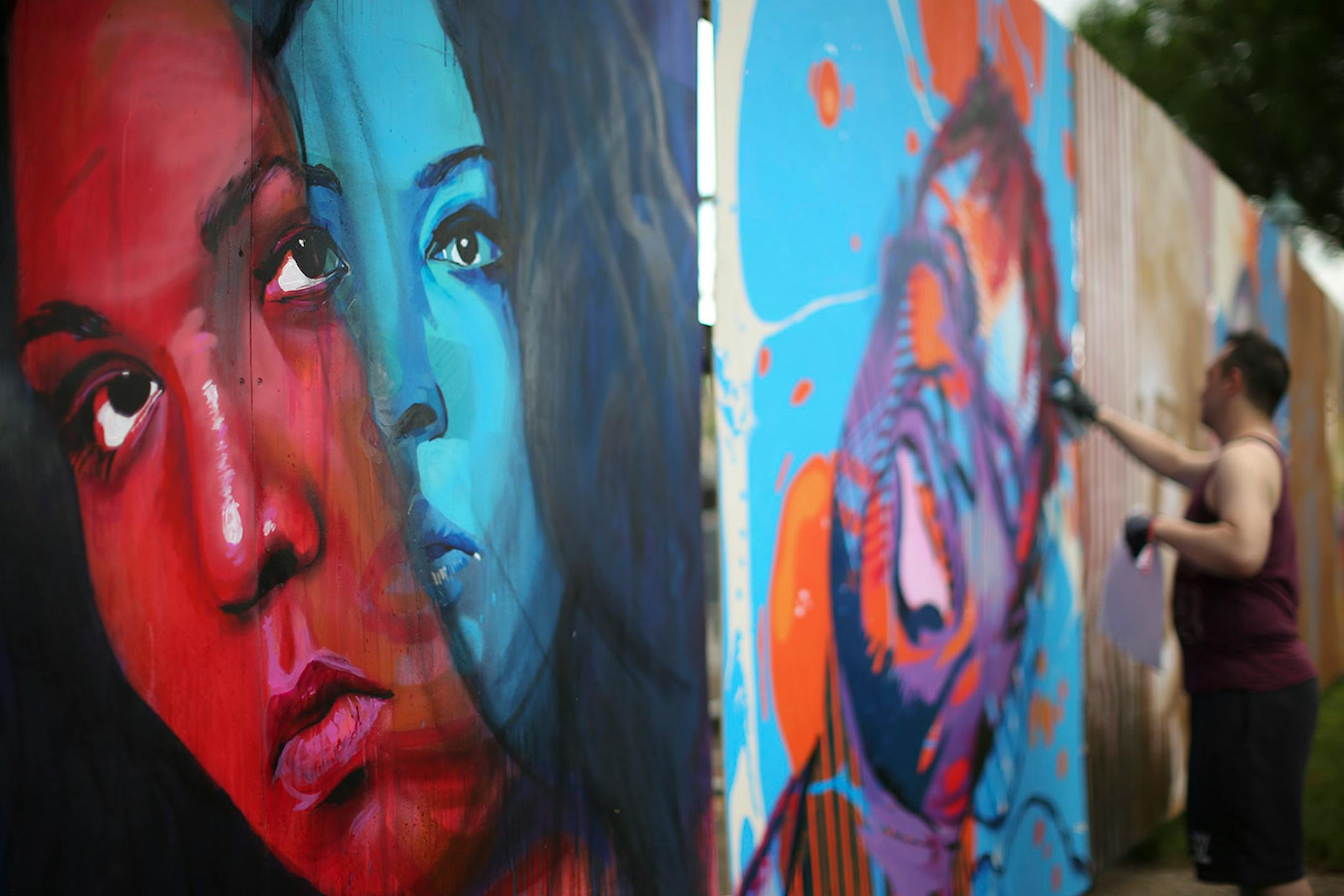 Wes Winship painted artists live as they performed Soundset 2016 on Sunday. He finished up Danny Brown during his set after already completing Lizzo.
