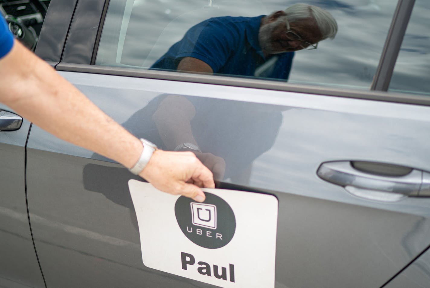 Uber driver Paul Linnee is fighting with the Metropolitan Airports Commission over his right to use a placard on the side of his car that says "UBER-PAUL." He says it offers Uber riders an additional layer of safety and convenience, especially after a student in South Carolina was murdered by a fake Uber driver. ] GLEN STUBBE &#x2022; glen.stubbe@startribune.com Wednesday, June 26, 2019