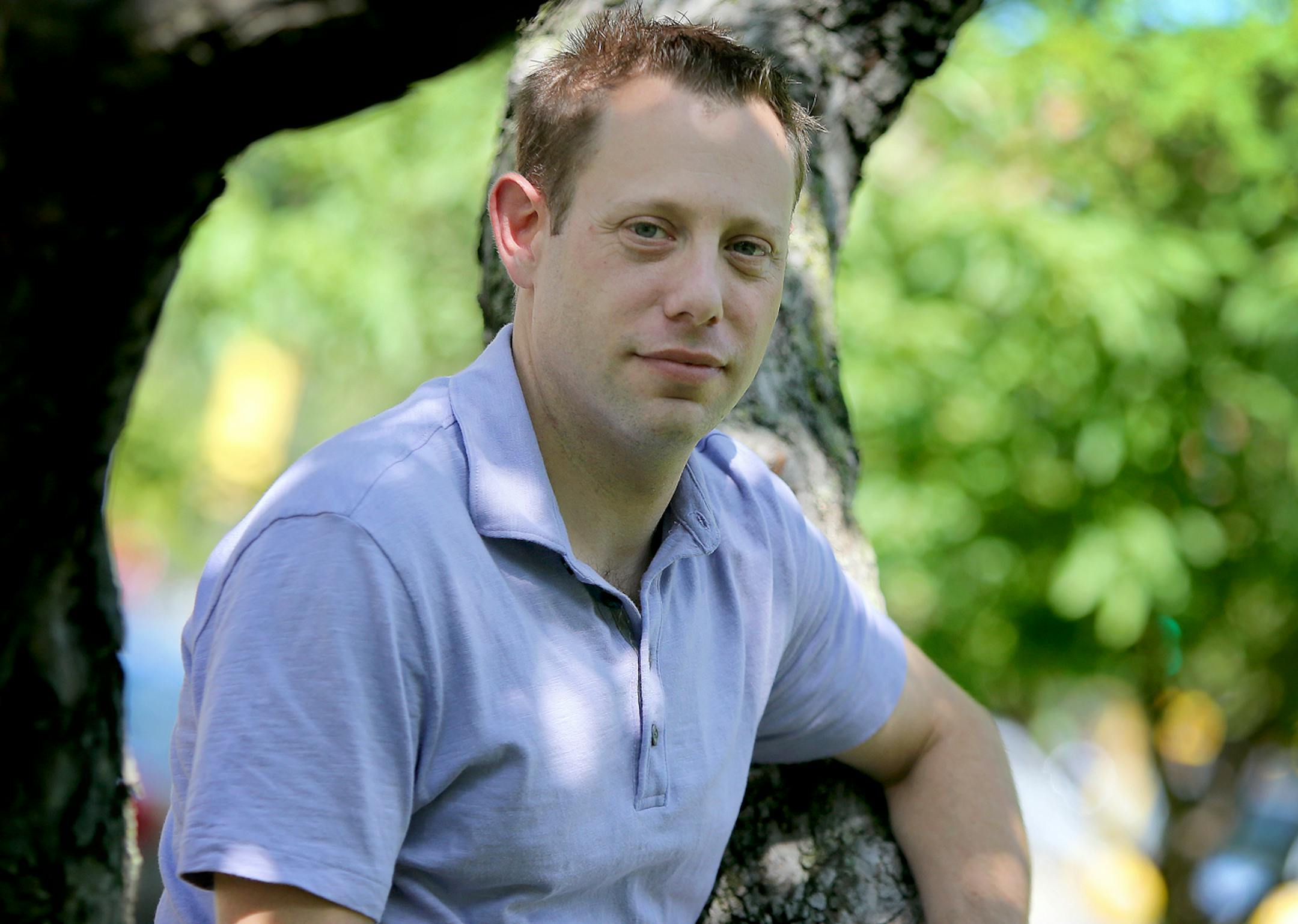 Jeff Zoss, 37, recently wore a 24-hour blood pressuring monitoring device to provide a more accurate blood pressure reading and hypertension diagnosis, provided by Allina. He said he received the results and everything looked healthy. Recently Ross took a lunch break in a downtown Minneapolis park, Friday, September 6, 2013.(ELIZABETH FLORES/STAR TRIBUNE) ELIZABETH FLORES • eflores@startribune.com