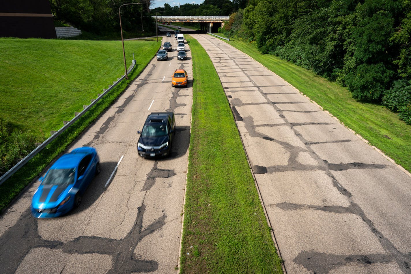 St. Paul's Ayd Mill Road is one of the metro's best known potholed-and-patched stretches, widely used as a diagonal shortcut between Interstate 35E and Selby Avenue.