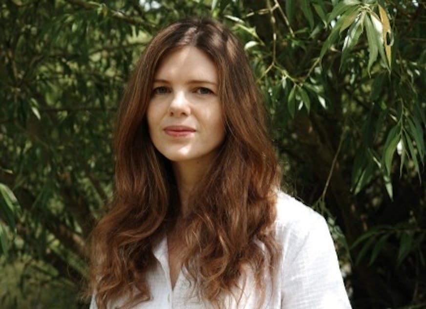 photo of author Xenobe Purvis in front of a tree