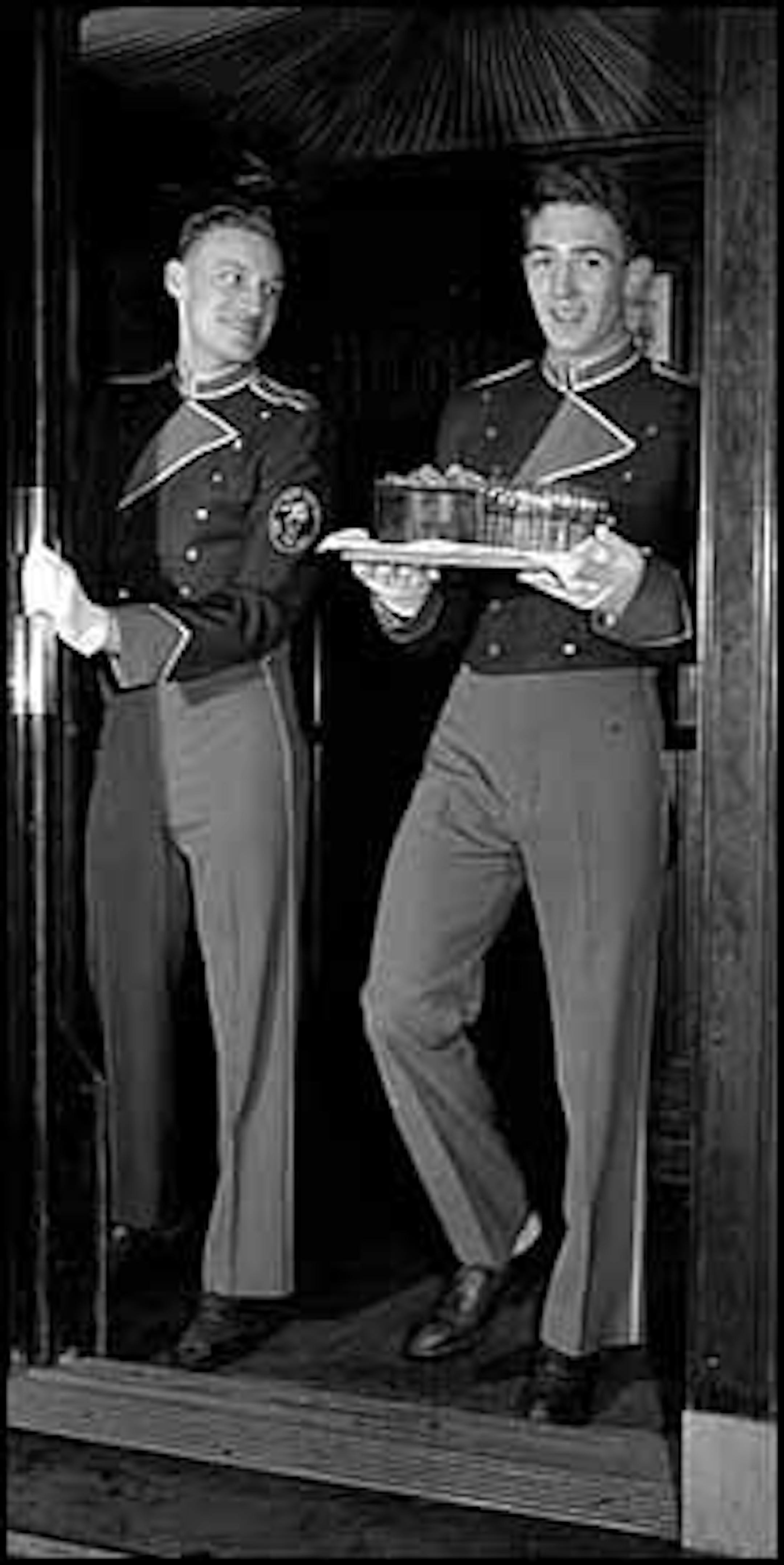 These hatless bellhops rode the elevators at the Nicollet Hotel in about 1924.