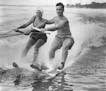 August 20, 1947 Experts on the Boards - The Timothy Quinns are pioneers in water skiing, They's shown here at Lake Minnetonka, in the wake of a speed 