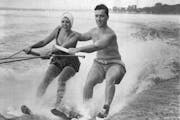 August 20, 1947 Experts on the Boards - The Timothy Quinns are pioneers in water skiing, They's shown here at Lake Minnetonka, in the wake of a speed 