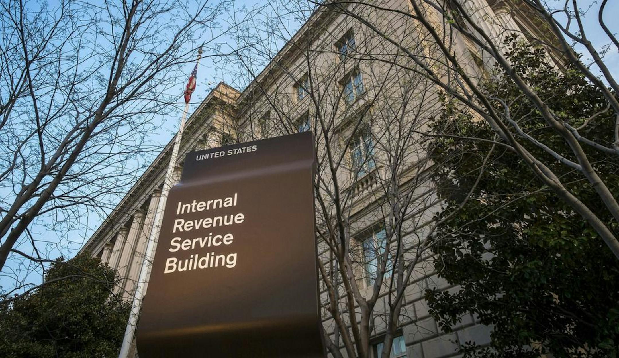 FILE - This April 13, 2014, file photo, shows the Internal Revenue Service headquarters building in Washington. Efforts to combat an escalating tax fraud problem are keeping thousands of legitimate filers from receiving their much-anticipated injection of tax return cash. Tax filers who opt to have their refund deposited directly onto debit cards are finding their cards frozen. The IRS said refund fraud caused by identity theft is one of its biggest challenges. In 2015, it stopped 1.4 million co
