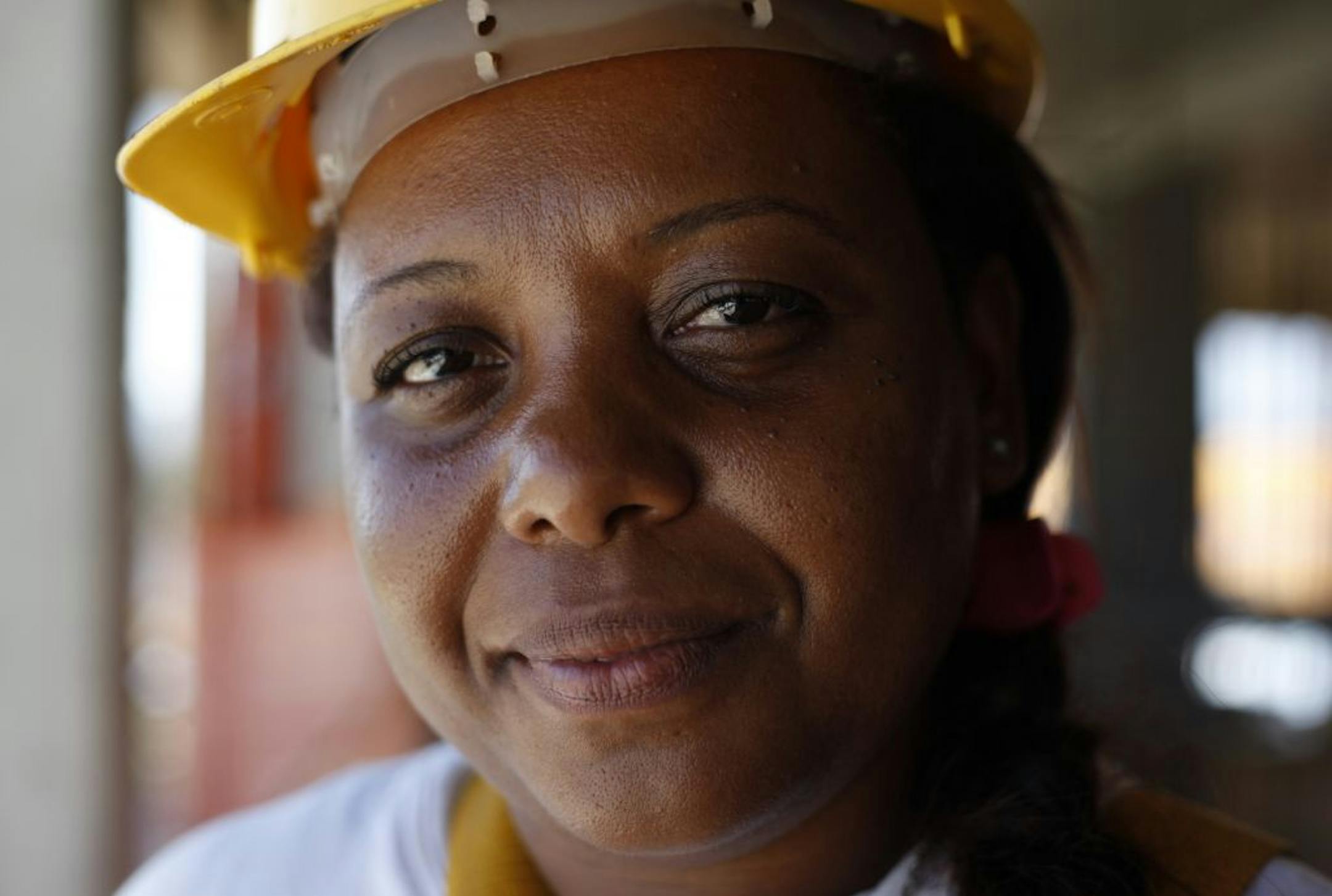 Fl�via Paula dos Santos, is employed a work site in in the Barra da Tijuca neighborhood in Rio De Janeiro, Brazil, Thursday March 8, 2012.