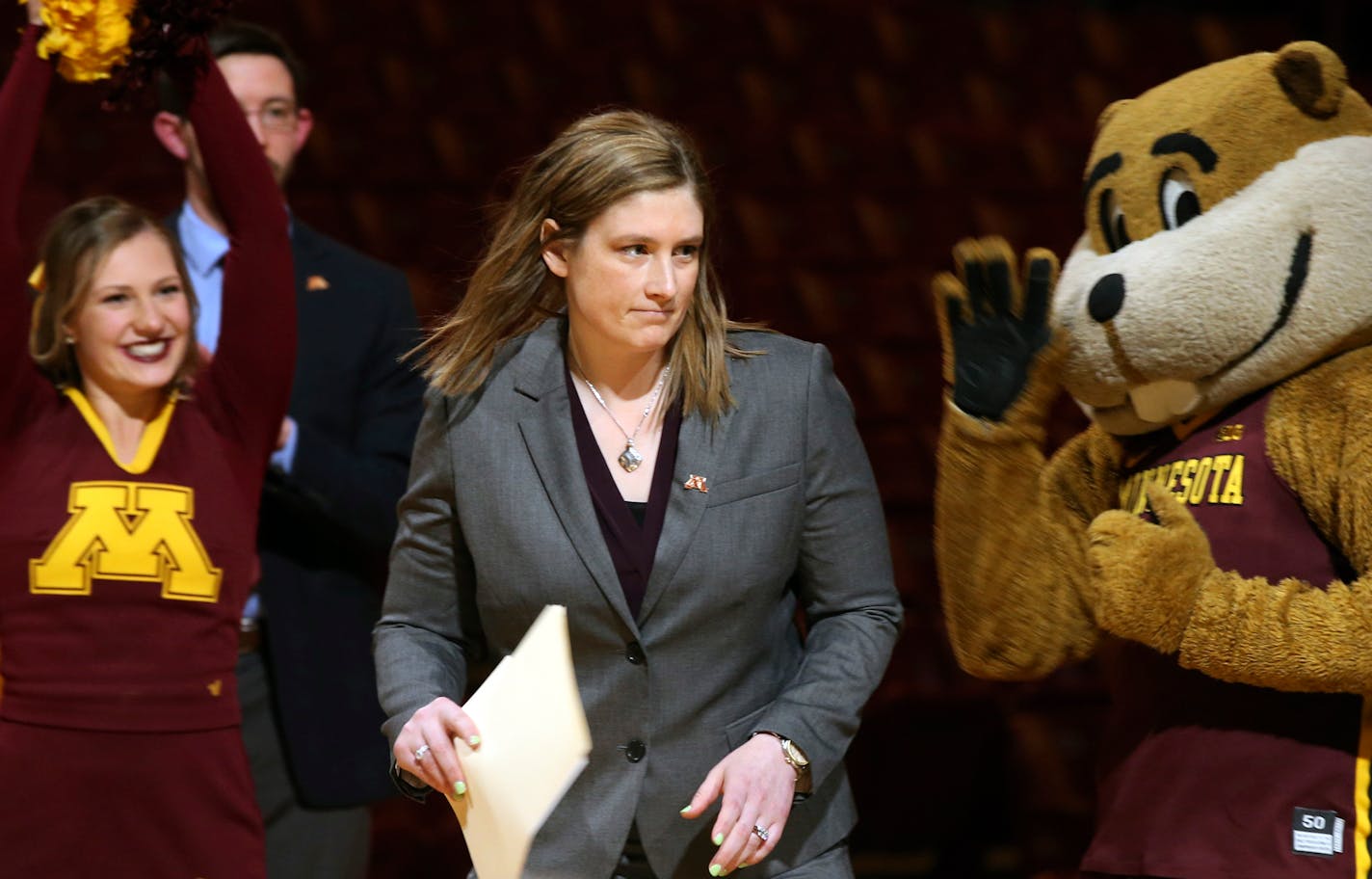 Lindsay Whalen will coach her first game for her alma mater on Friday night.