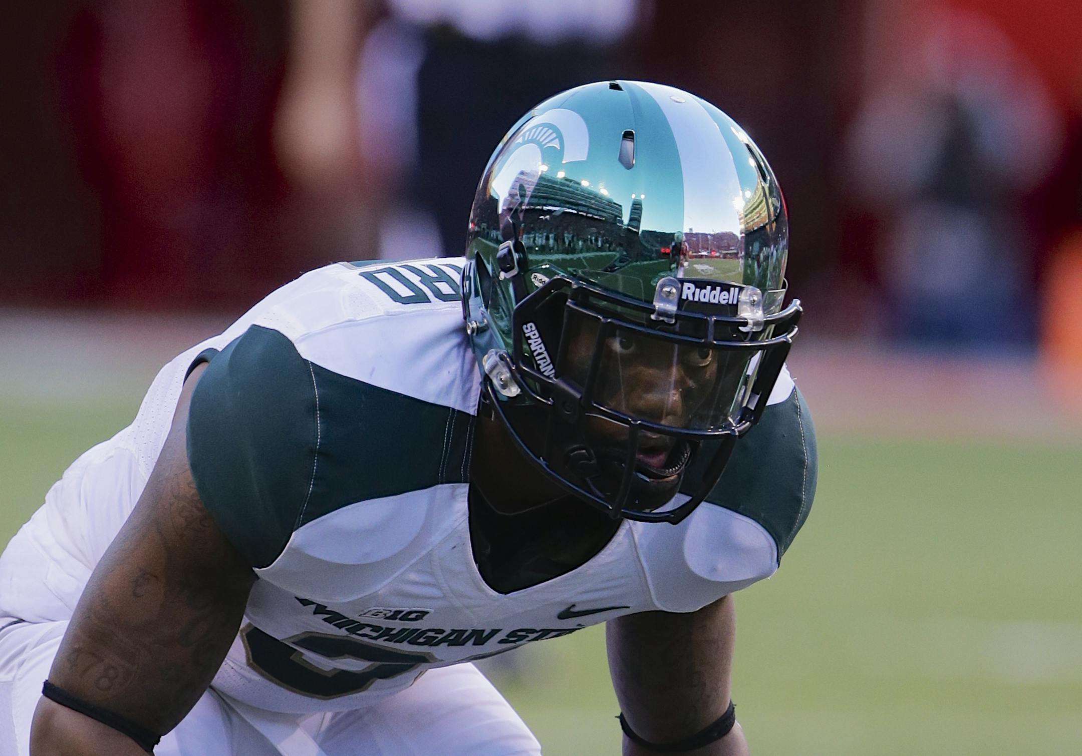 Michigan cornerback Darqueze Dennard (31) lines up in the second half of an NCAA college football game against Nebraska in Lincoln, Neb., Saturday, Nov. 16, 2013. (AP Photo/Nati Harnik) ORG XMIT: MIN2013120618014418