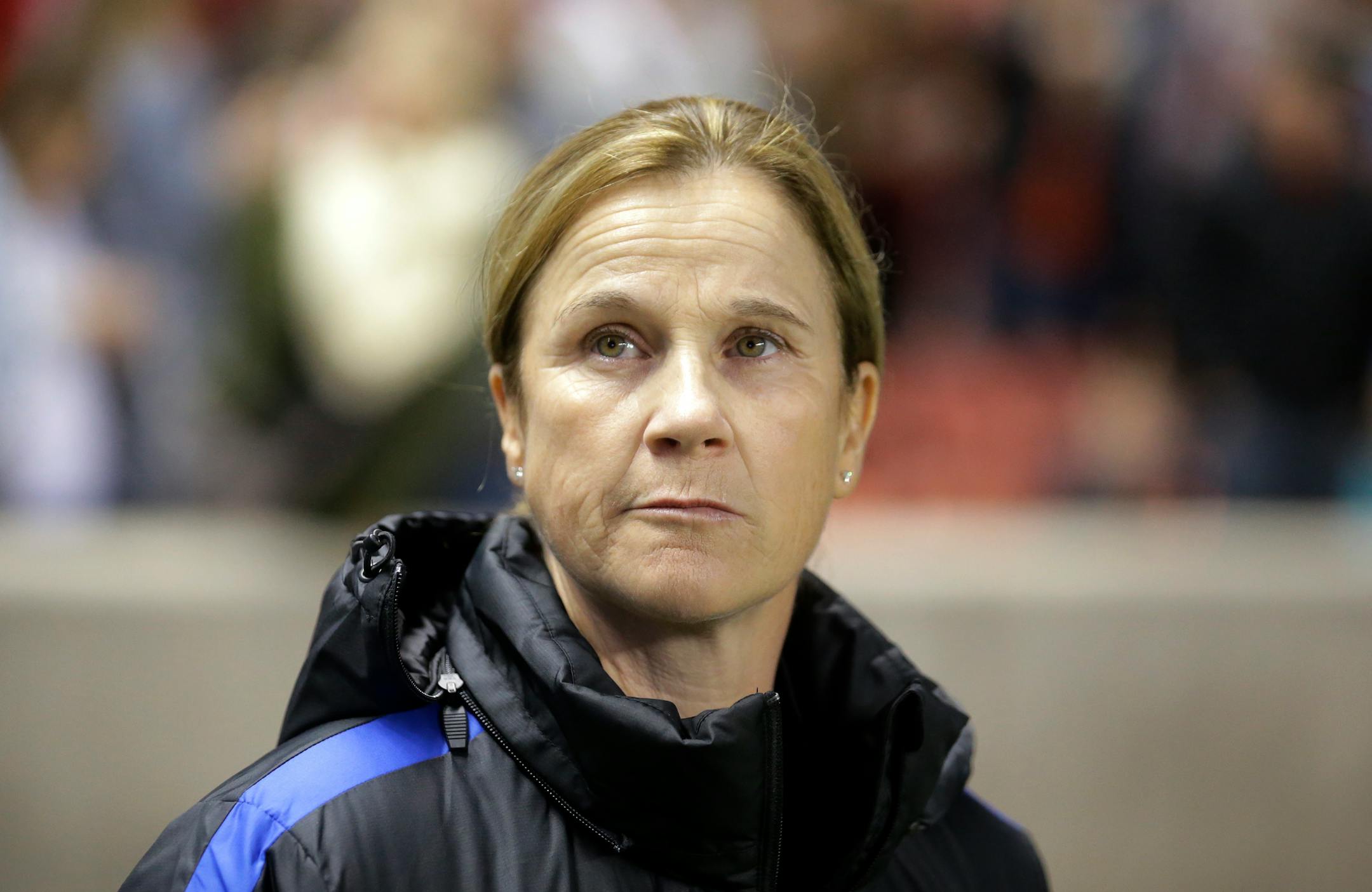 U.S. coach Jill Ellis waits for the start of the team's international friendly soccer match against Switzerland on Wednesday, Oct. 19, 2016, in Sandy, Utah.