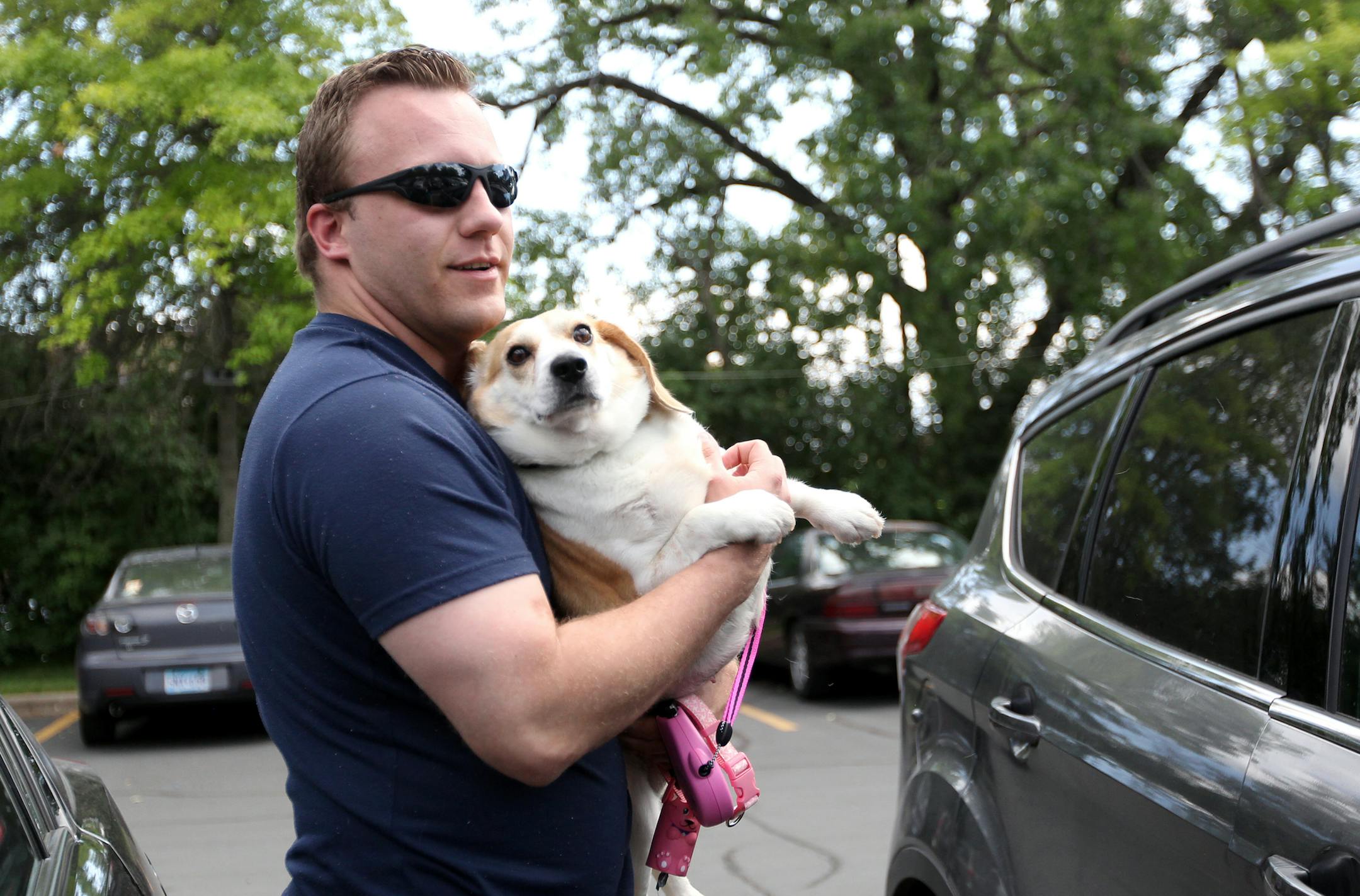 Bryce Wergeland got ready to take home his rescue beagle mix, Molly, from the Animal Humane Society in Golden Valley.