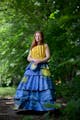 Teen fashionista Ava Motl stands for a portrait wearing her duct tape prom dress inspired by Vincent van Gogh’s Starry Night Saturday, July 1, 2023,