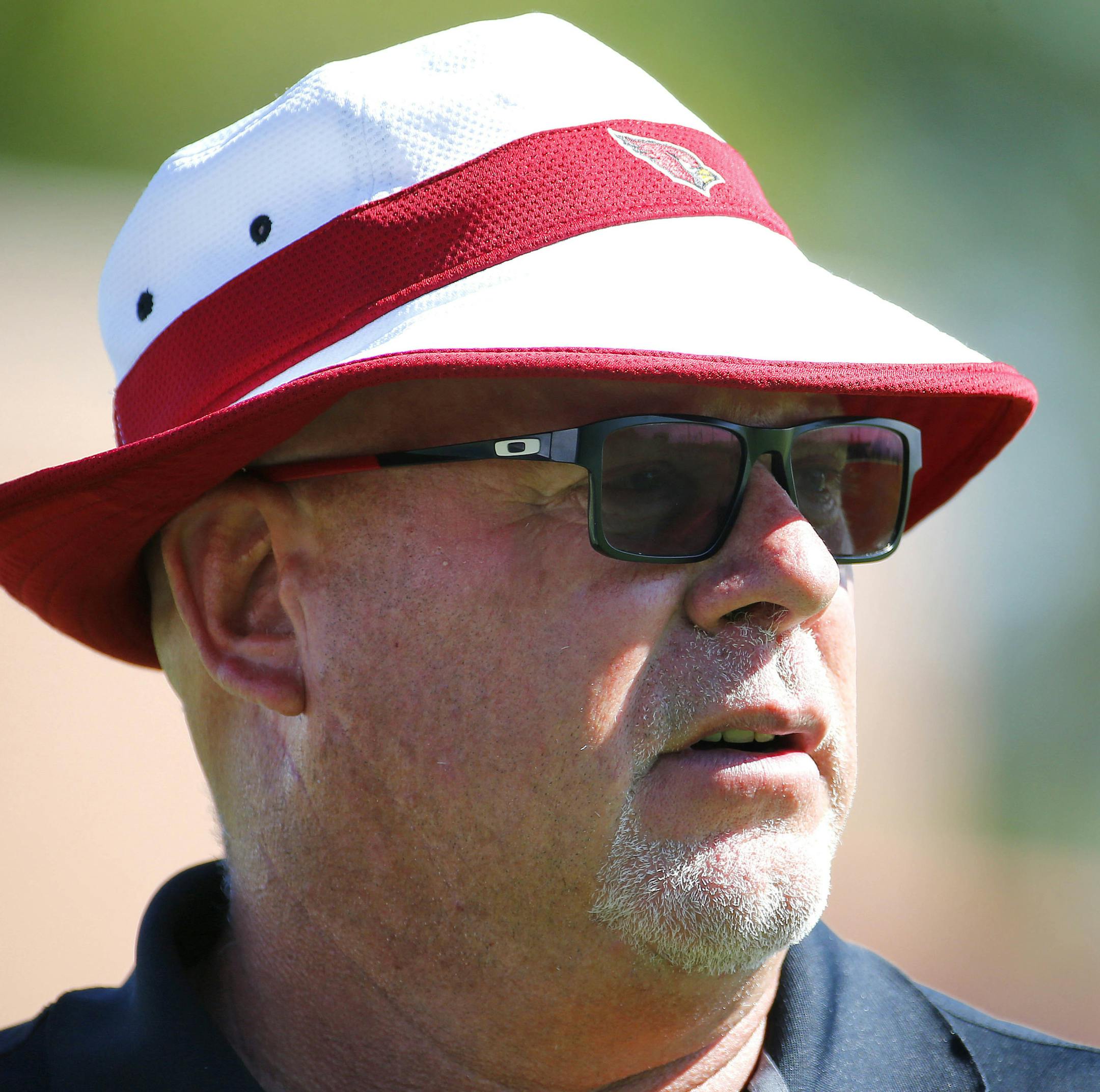 Arizona Cardinals head coach Bruce Arians runs drills during an NFL football minicamp, Tuesday, June 7, 2016, in Tempe, Ariz. (AP Photo/Matt York)