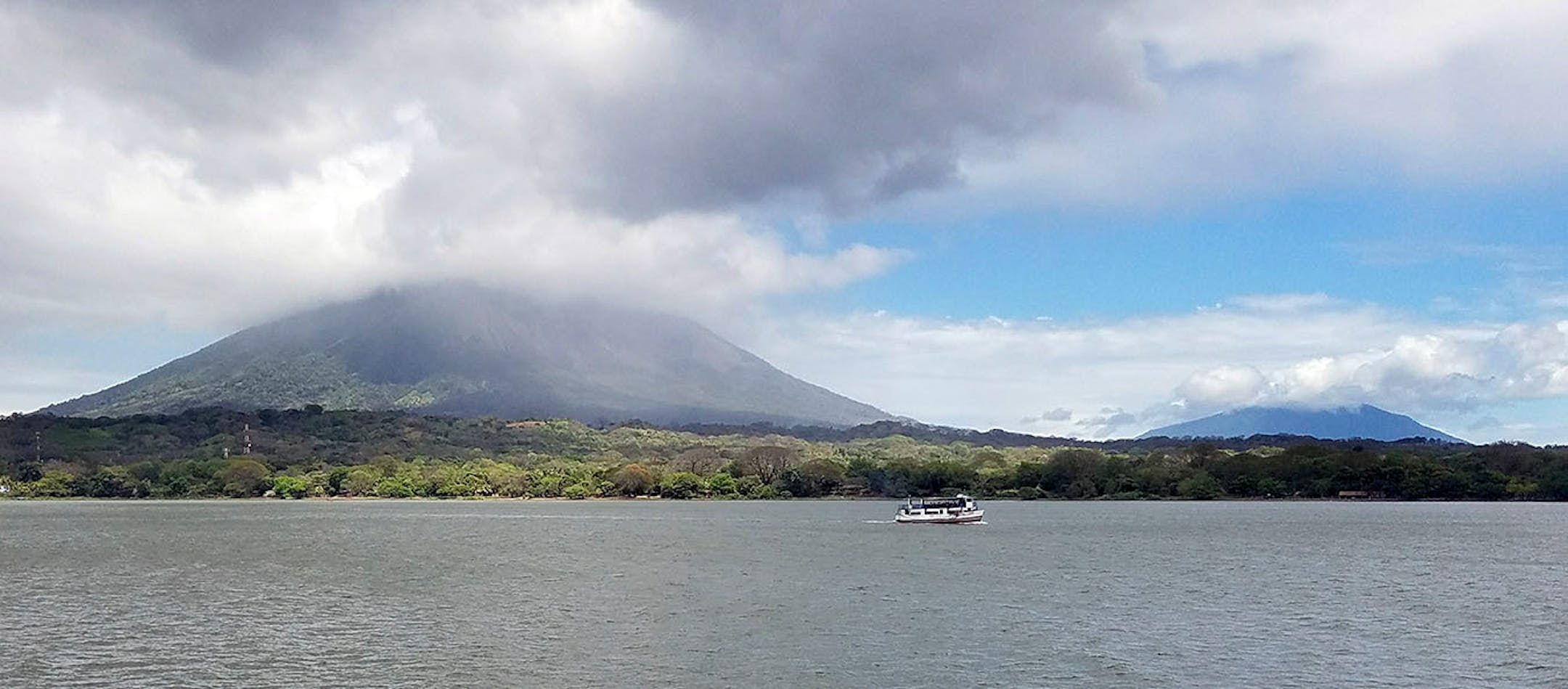 The volcanos Concepcion (left) and Maderas, which form the island of Ometepe, can be seen from the passenger ferry to the island in Lake Nicaragua.