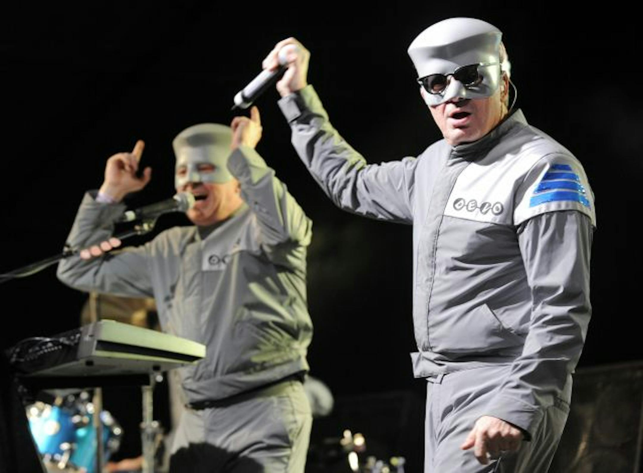 Mark Mothersbaugh, right, and Gerald Casale of Devo perform during the band's midnight performance at the close of the second day of the Coachella Valley Music and Arts Festival in Indio, Calif., Saturday, April 17, 2010.