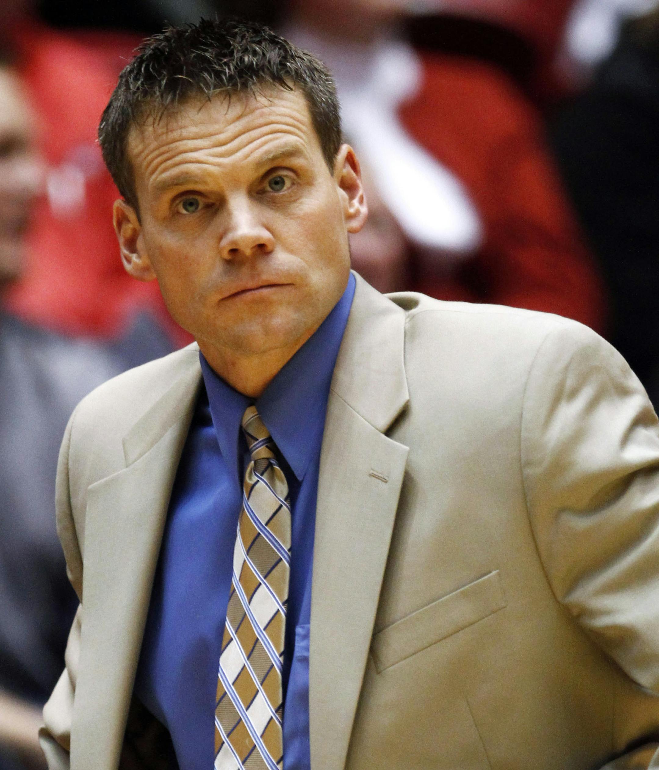 Iowa interim coach Chad Walthall looks on during the second half of an NCAA college basketball game against Iowa State, Friday, Dec. 11, 2009, in Ames, Iowa. Iowa State won 81-71. (AP Photo/Charlie Neibergall) ORG XMIT: IACN108