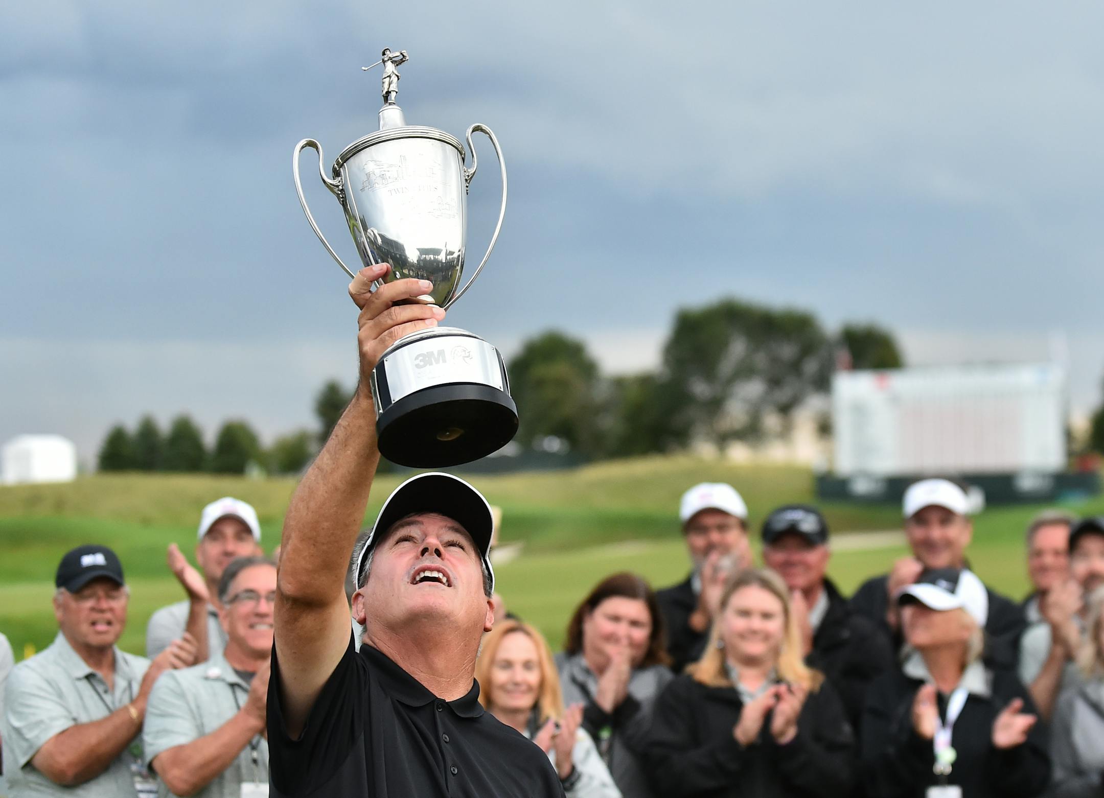 Paul Goydos showed off his spoils after winning the 3M Championship last summer.