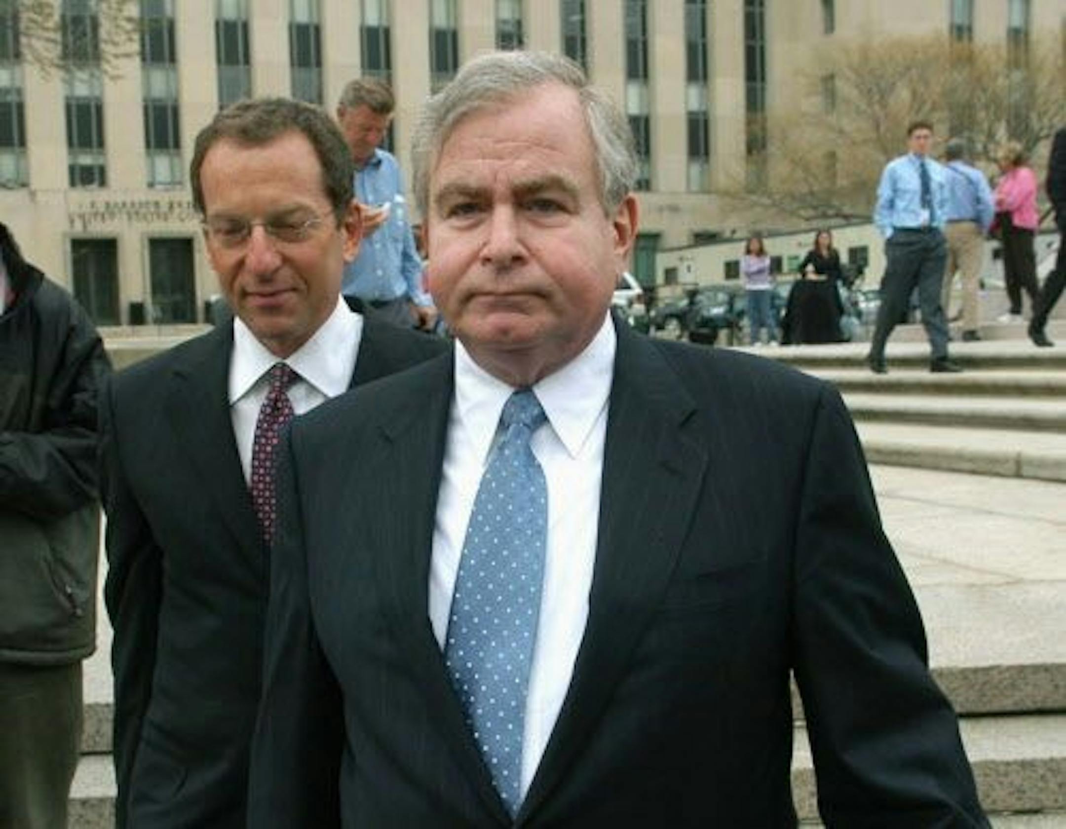 FILE - In this April 1, 2005 file photo, Sandy Berger, who was President Clinton's top national security aide, leaves the U.S. District Court House in Washington.