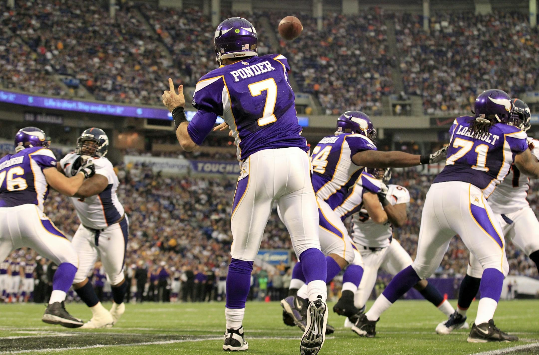 Vikings quarterback Christian Ponder (7) threw for a first down out of his end zone in the second quarter against the Broncos.