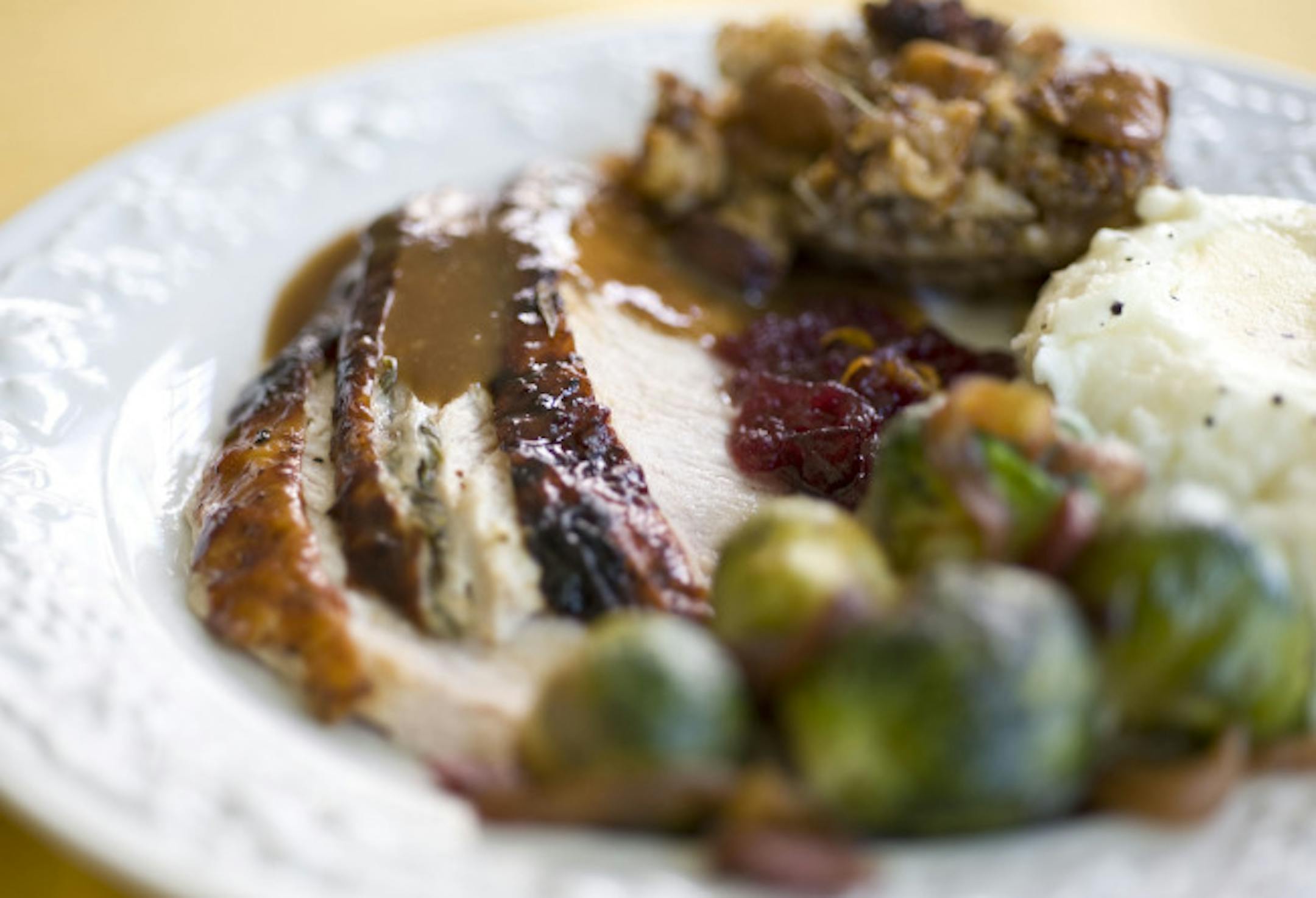 Chef Erika Di Battista, owner of the Sunfish Grill, shares her Thanksgiving recipes including from left, Sweet Morning Sausage and Apple Stuffing; Parsnips Whipped Potatoes; Cider-Glazed Rosemary Turkey With Apples and Onions; and Sauteed Brussel Sprouts With Applewood Smoked Bacon and Onions.