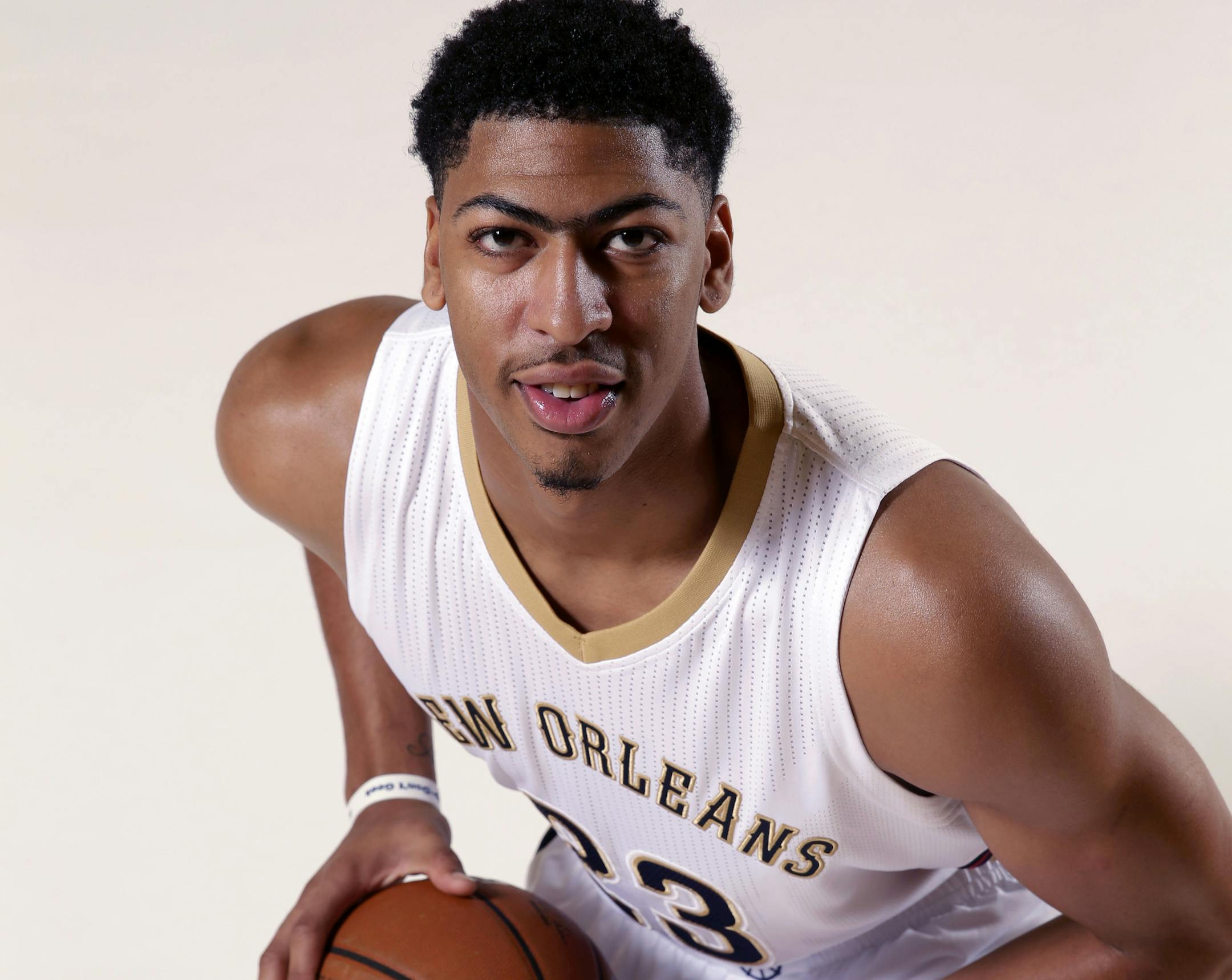 New Orleans Pelicans forward Anthony Davis (23) poses at the Pelicans NBA basketball media day in Metairie, La., Monday, Sept. 29, 2014. (AP Photo/Gerald Herbert) ORG XMIT: NYOTK