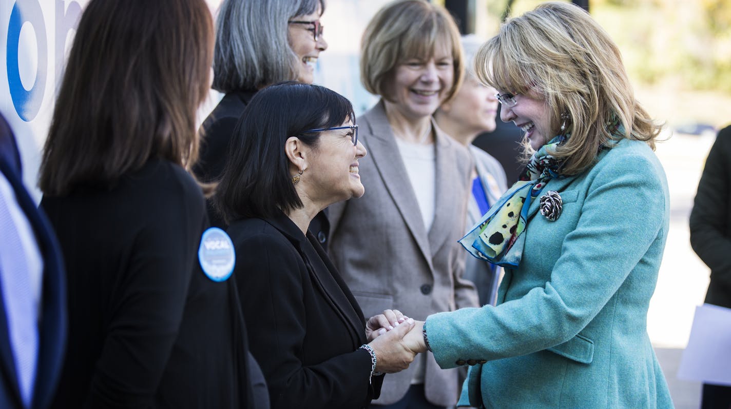 Former U.S. Rep. Gabrielle Giffords, right, greets Terri Bonoff, candidate for Minnesota's 3rd congressional district, during a kickoff event for gun violence prevention. ] (Leila Navidi/Star Tribune) leila.navidi@startribune.com BACKGROUND INFORMATION: Former U.S. Rep. Gabrielle Giffords speaks with candidates for Minnesota state offices during a DFL Canvass Kickoff and start of the Minnesota leg of the 2016 Vocal Majority Tour in Minnetonka on Wednesday, October 5, 2016. Giffords is a co-found