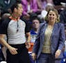 Minnesota Lynx coach Cheryl Reeve argues with official Isaac Barnett during the second half of the team's WNBA basketball game against the Connecticut