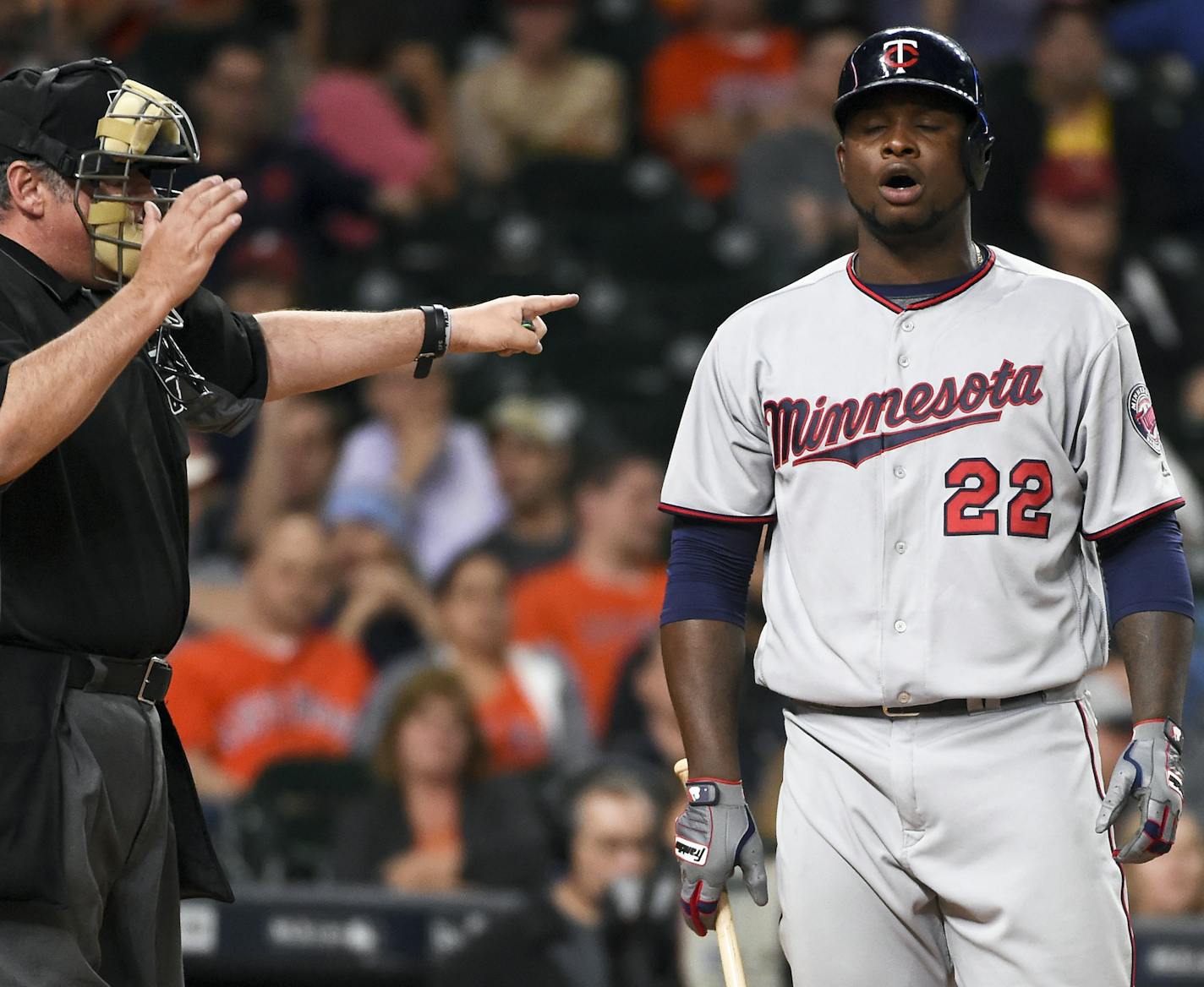 Minnesota Twins' Miguel Sano (22) reacts after being called out on strikes by home plate umpire Hunter Wendelstedt in the eighth inning of a baseball game against the Houston Astros, Tuesday, May 3, 2016, in Houston.