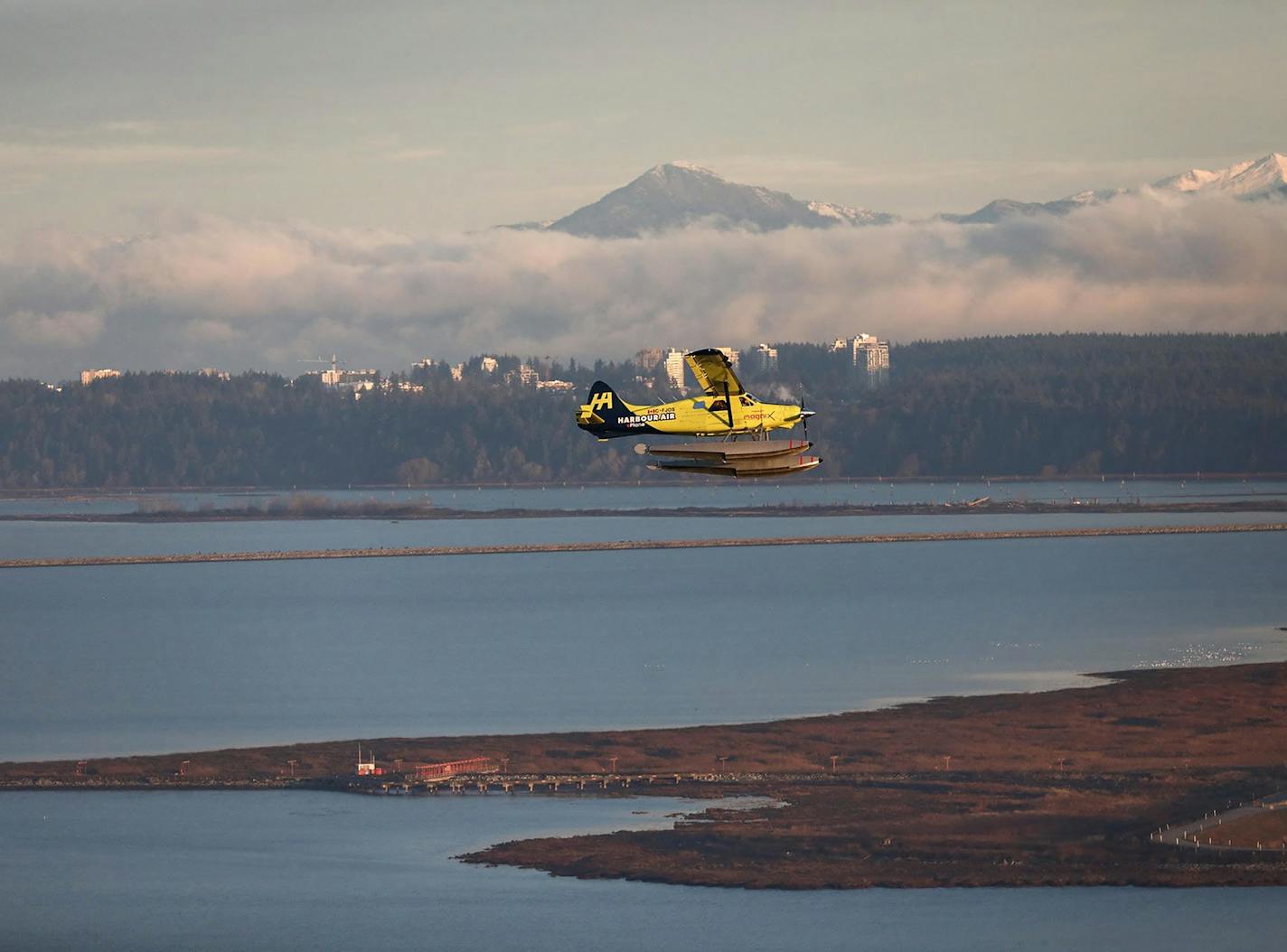 -- PHOTO MOVED IN ADVANCE AND NOT FOR USE - ONLINE OR IN PRINT - BEFORE DEC. 29, 2019. -- In an image provided by Harbour Air, the vintage de Havilland Beaver airplane on its first test flight with a battery-powered engine in Vancouver, Canada, Dec. 10, 2019. The Vancouver-based airline's goal is an all electric fleet, the first in the world. (Harbour Air via The New York Times) -- NO SALES; FOR EDITORIAL USE ONLY WITH NYT STORY ELECTRIC SEAPLANE ADV29 BY MIKE ARNOT FOR DEC. 26, 2019. ALL OTHER