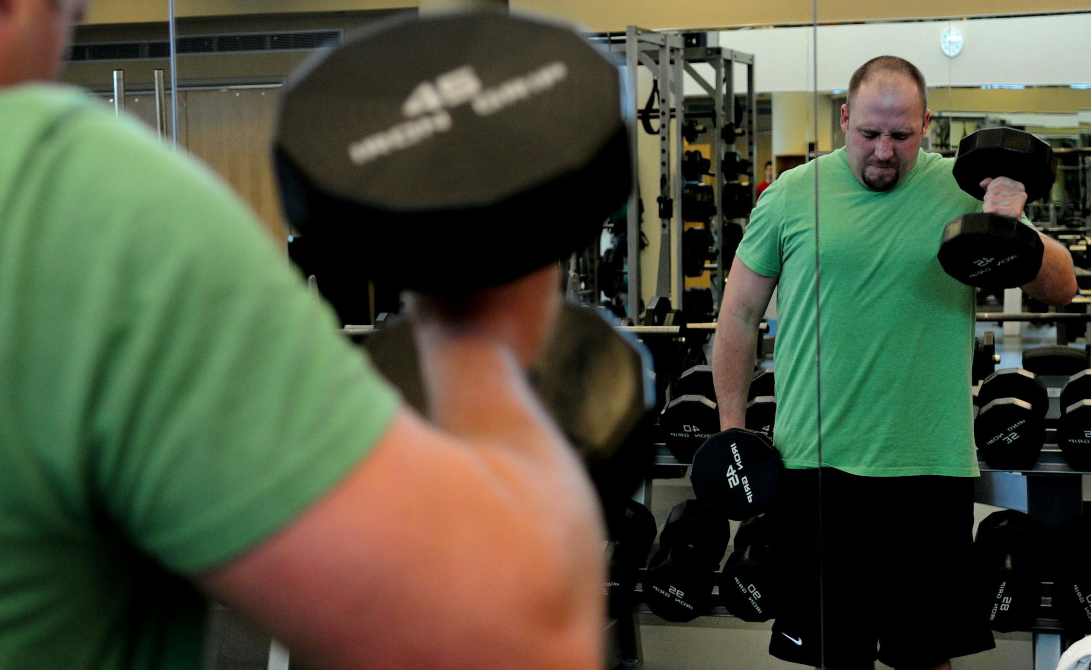 Richard Sennott@startribune.com Rochester Mn. Wednesday 01/18/11 : ] Deputy Andy Hamann works out 3 times a week at the Dan Abraham Healthy Living Center in Rochester. He routine is focused on core strength and leg strength training.