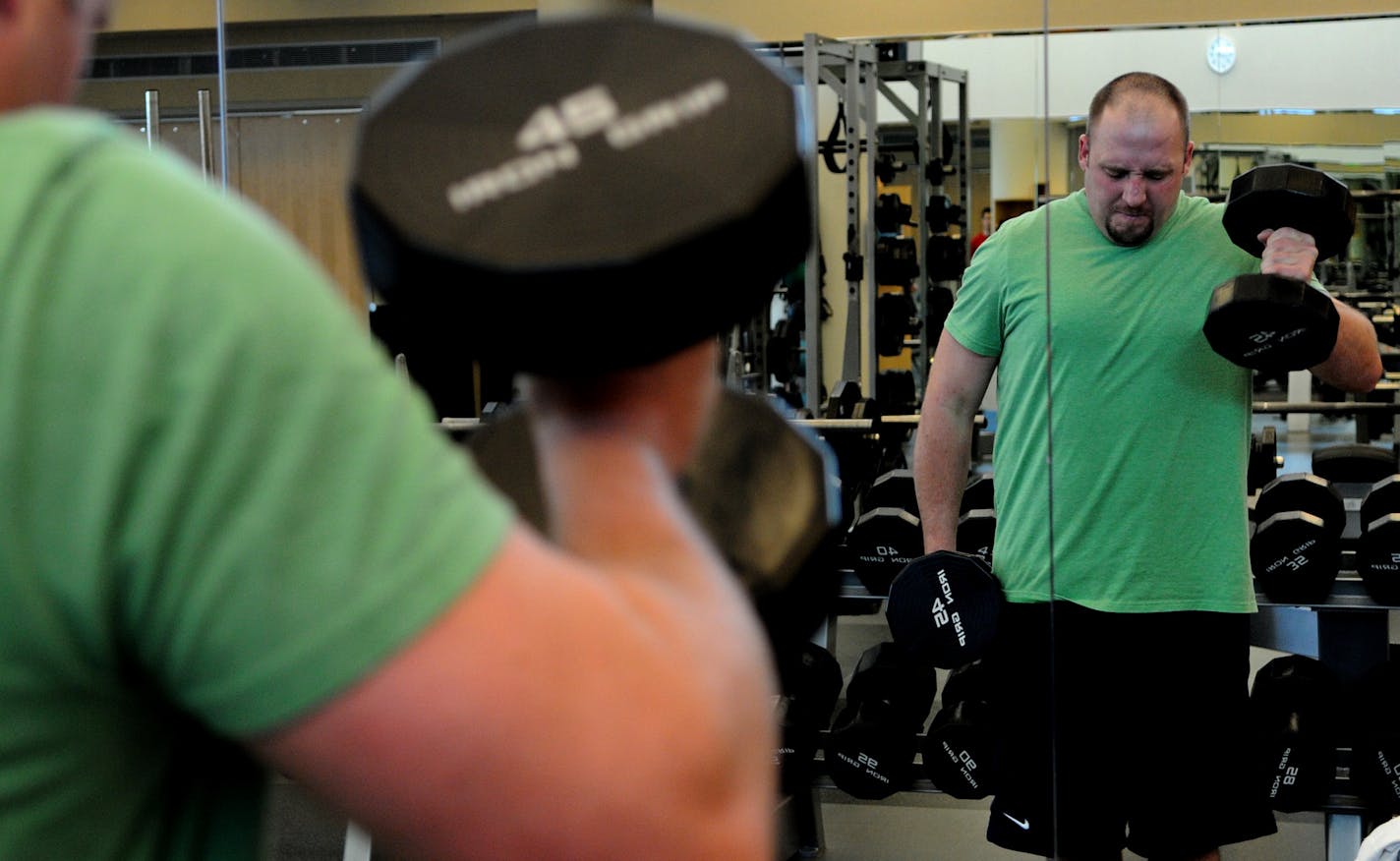 Richard Sennott@startribune.com Rochester Mn. Wednesday 01/18/11 : ] Deputy Andy Hamann works out 3 times a week at the Dan Abraham Healthy Living Center in Rochester. He routine is focused on core strength and leg strength training.