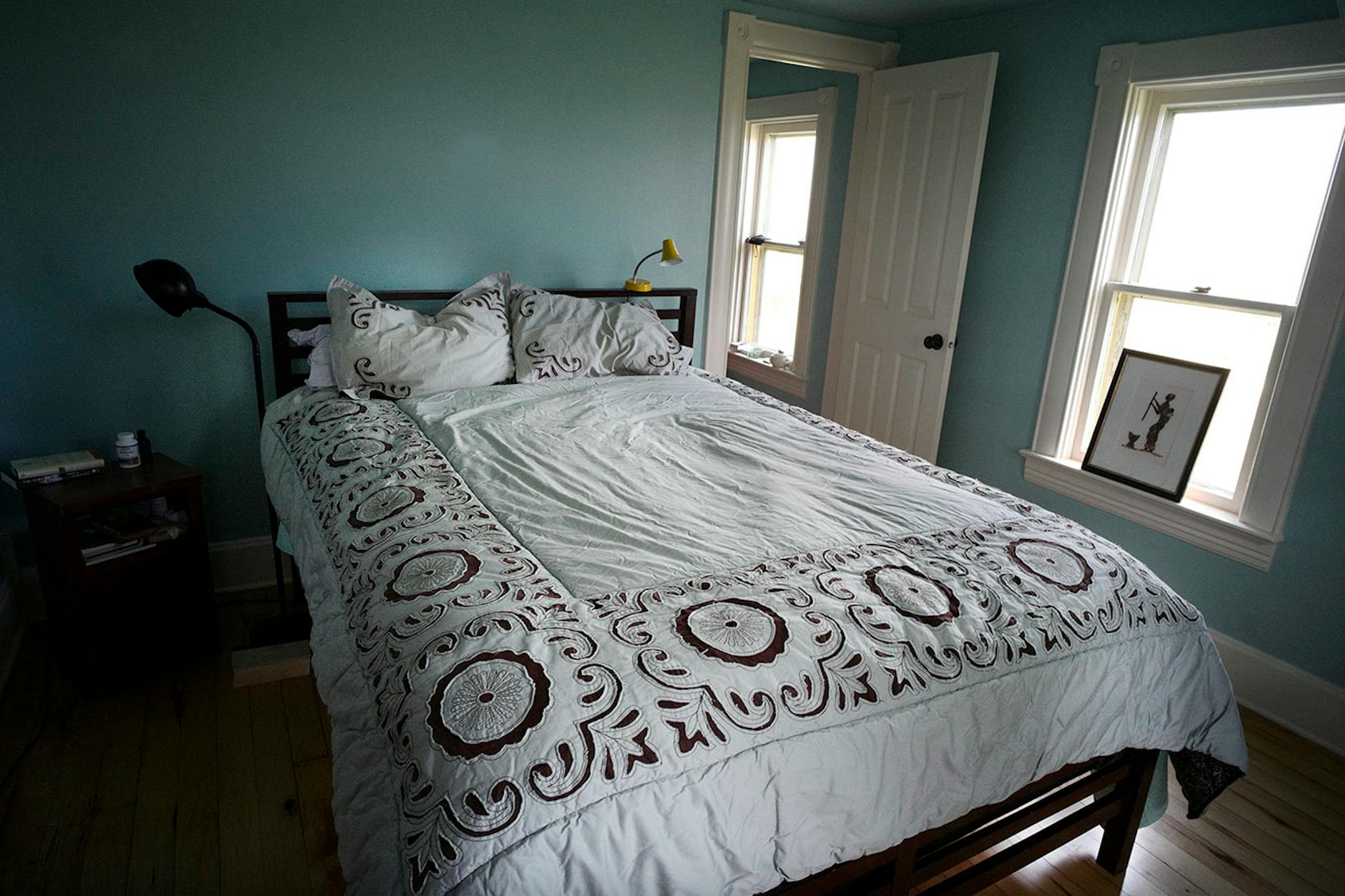 The master bedroom was refreshed with new paint and refinished hardwood floors.