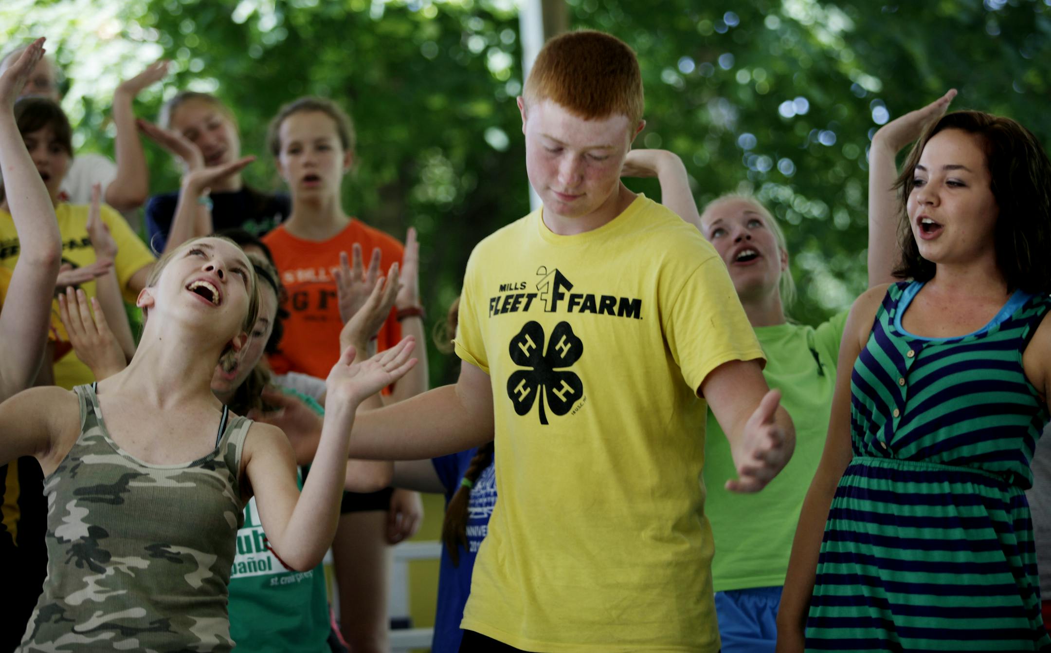 Alyssa King (left), Mike Slater and Abby Persoon practiced in preparation for the "Arts-In" show for the Washington County Fair in Lake Elmo, MN. on July 16, 2013. ] JOELKOYAMA‚Ä¢joel koyama@startribune July 12, 2013. ] JOELKOYAMA‚Ä¢joel koyama@startribune An "Arts-In" camp will be preparing skits, painting art work, rehearsing music, etc., in preparation for Washington County Fair. Camp also is open Monday, although there might be more to see on Tuesday. This i