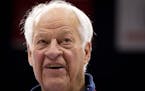 In this Feb. 2, 2012 file photo, Hockey Hall of Famer Gordie Howe, part owner of the Western Hockey League's Vancouver Giants, looks on during news co