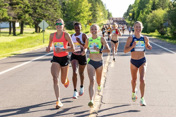On Saturday, Dakotah Lindwurm (wearing a green shirt) posted the second-best women’s time in Grandma’s Marathon history.