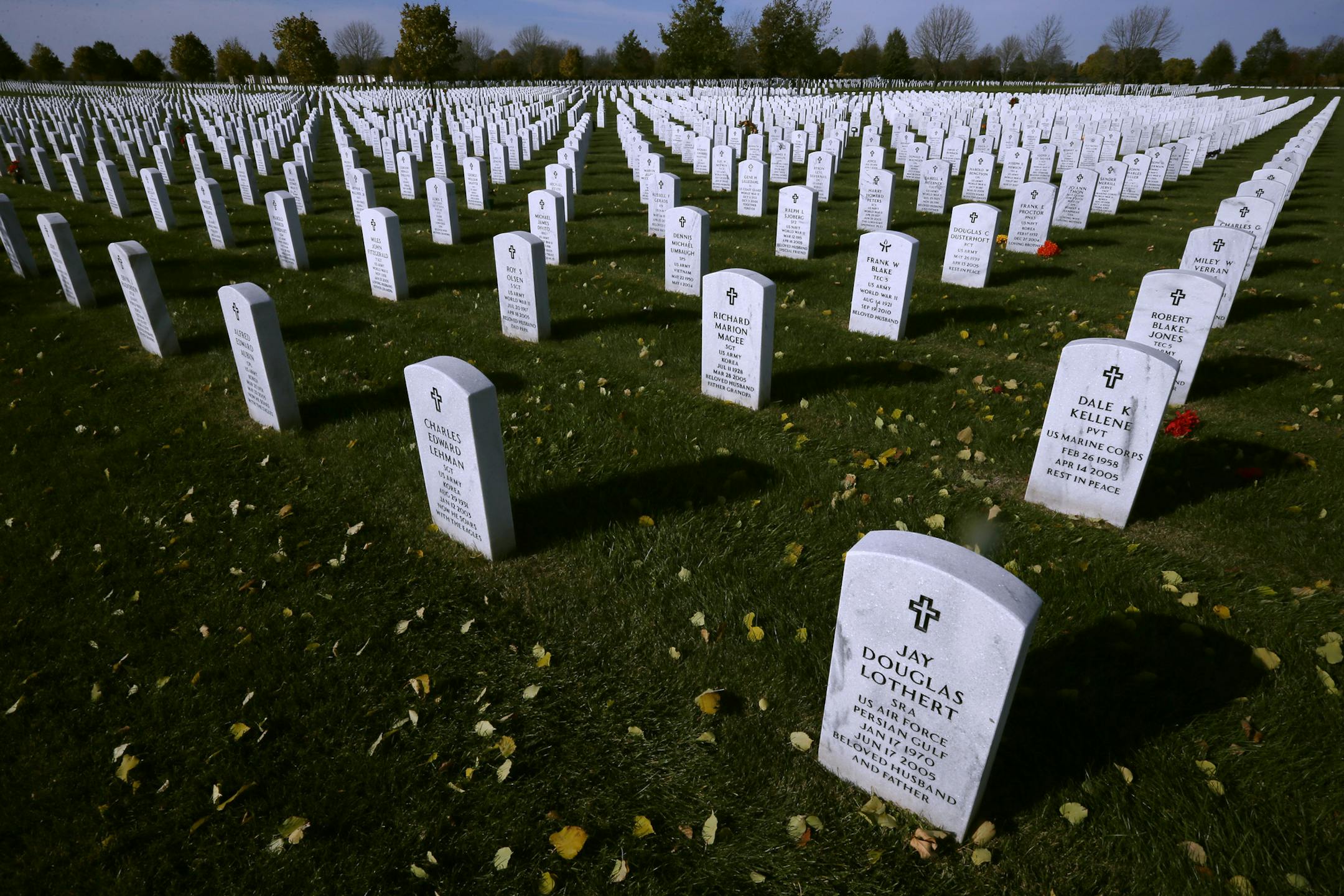 Lines and lines of headstone at Ft Snelling Snelling Cemetery Sunday November 3, 2013 in Bloomington, MN. 2012 Looking into the backstory behind the distinctive look of veterans' cemeteries, how the perfect symmetry came to be and what it represents. some other vet cemetery history as well ] JERRY HOLT ‚Ä¢ jerry.holt@startribune.com