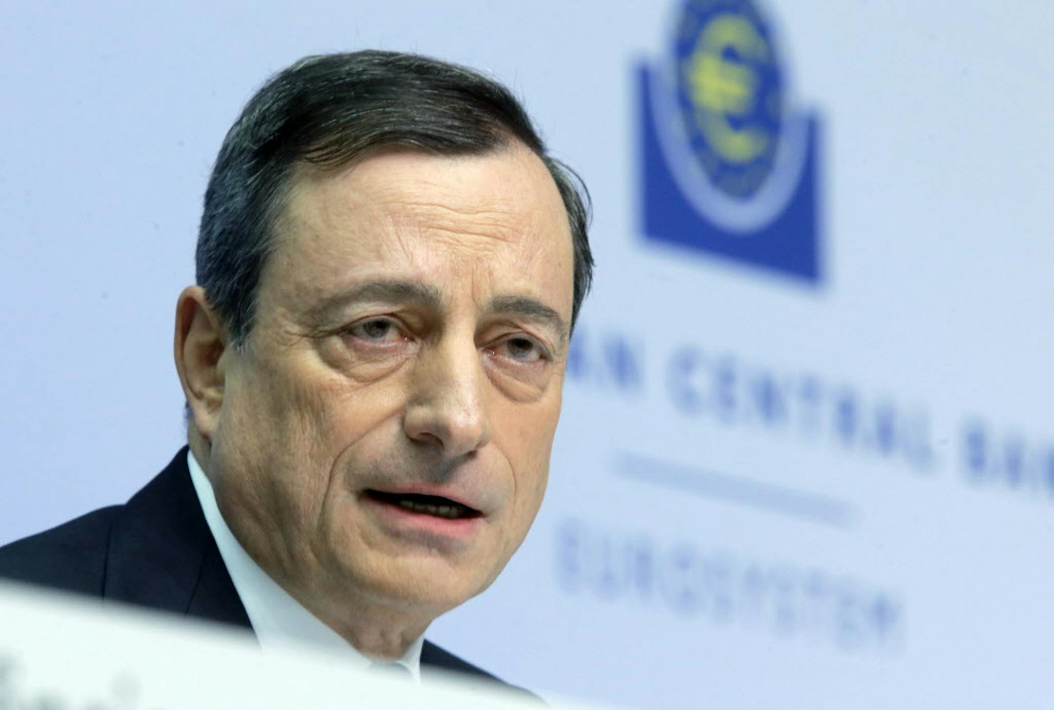 President of European Central Bank Mario Draghi speaks during a news conference in Frankfurt, Germany, Thursday, Jan. 22, 2015, following a meeting of the ECB governing council. (AP Photo/Michael Probst)
